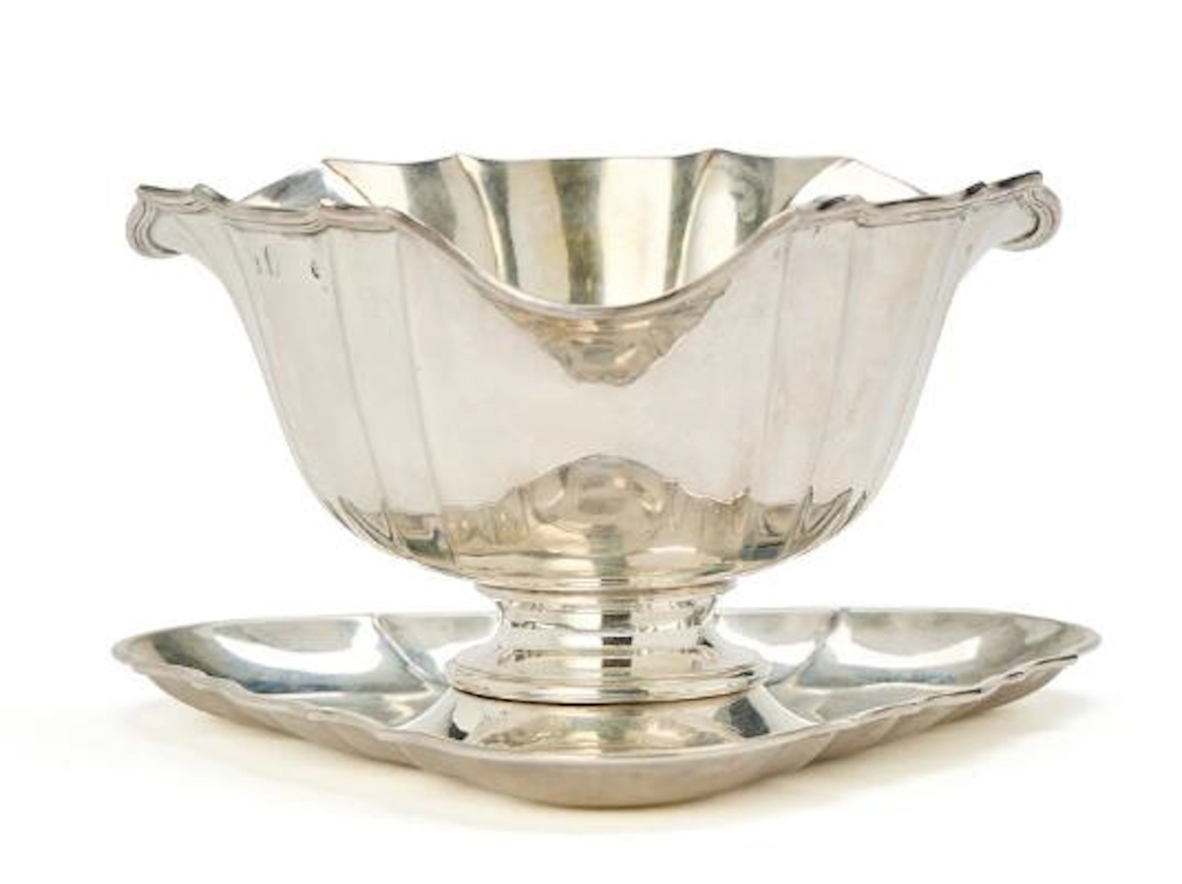A threesided saucebowl on dish. A. Dragsted. Copenhagen citymark 1902.