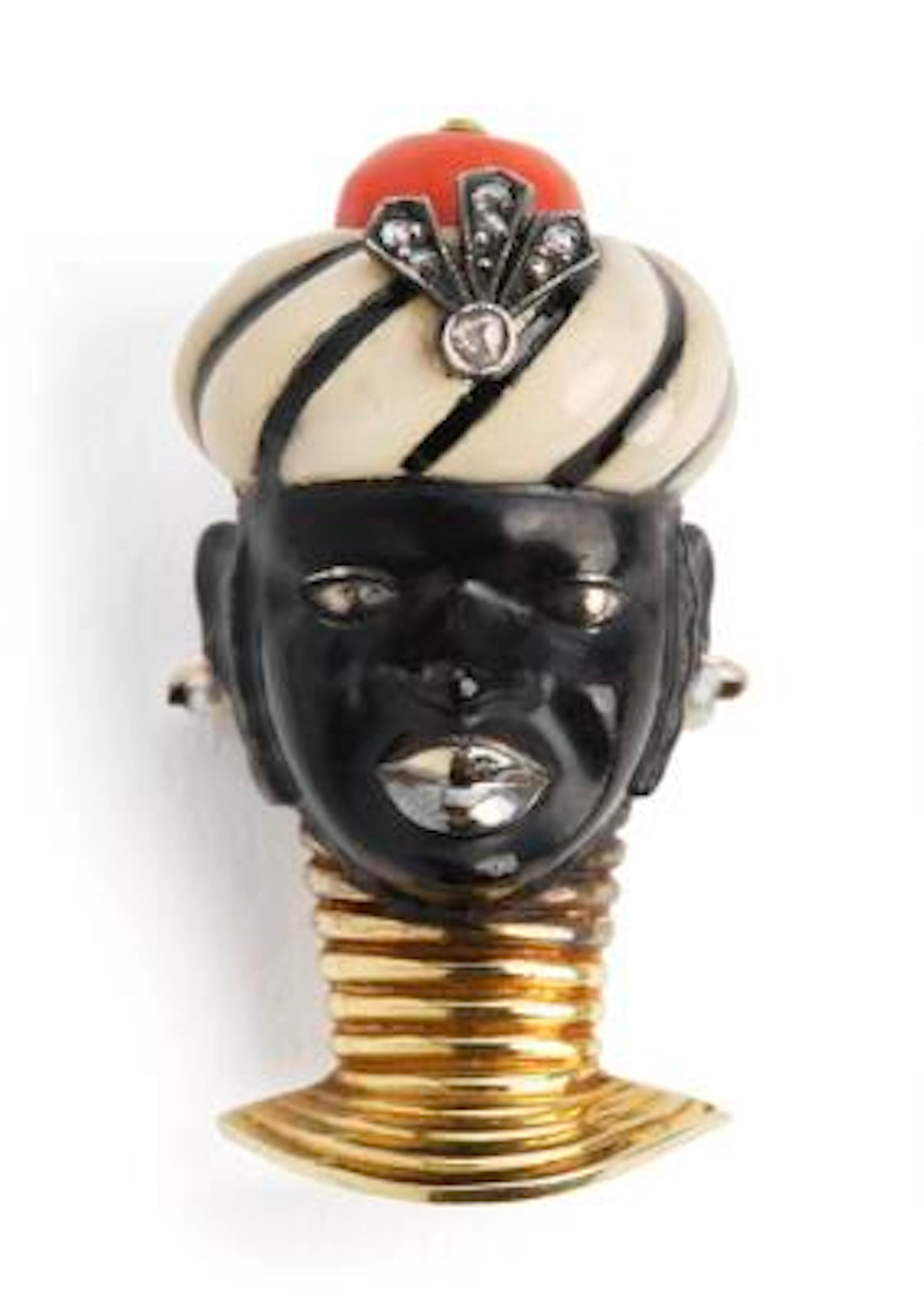 Cartier: A coral, enamel and diamond brooch in the shape of a face