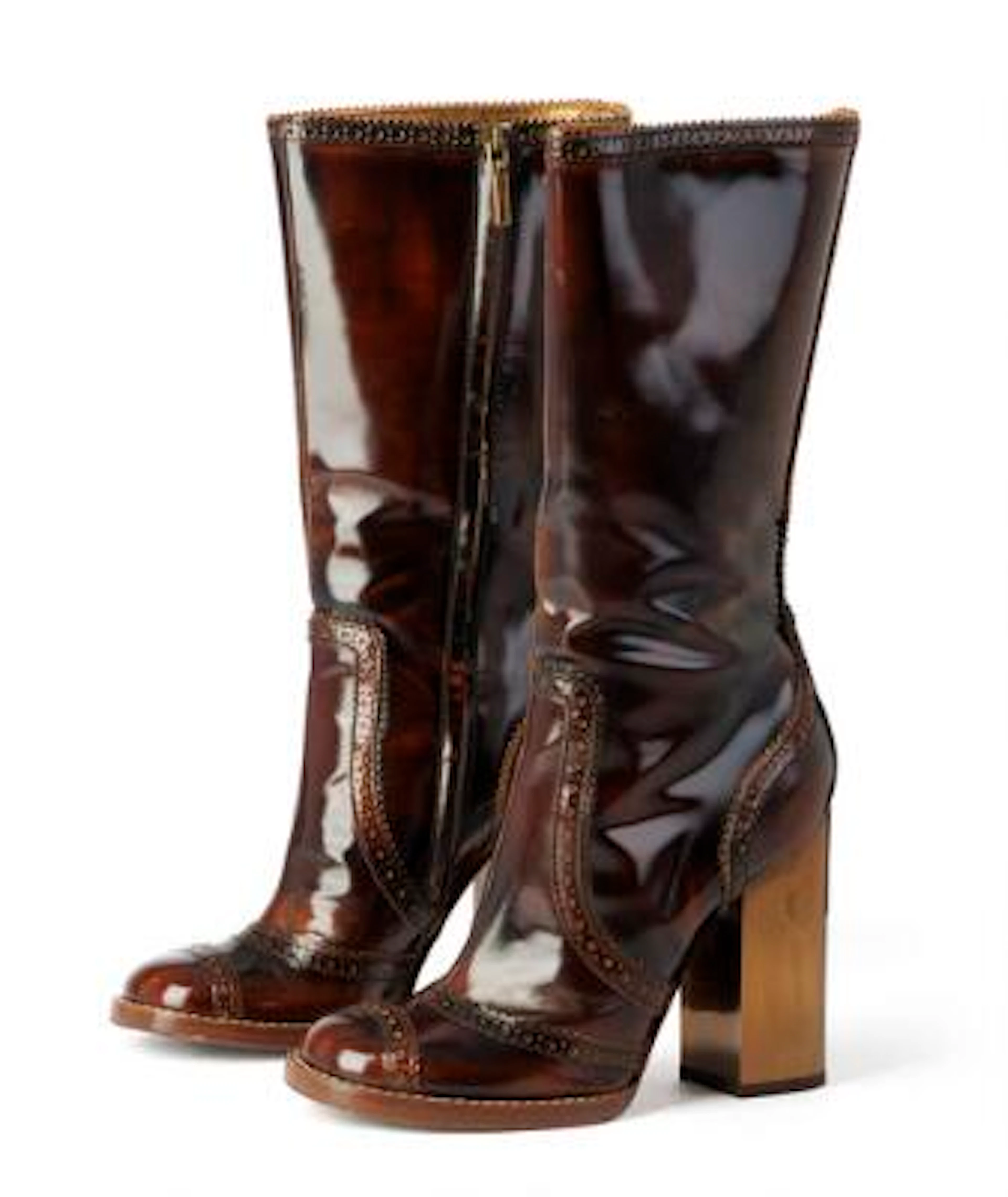 Dolce & Gabbana: A pair of high heeled boots of brown patent leather