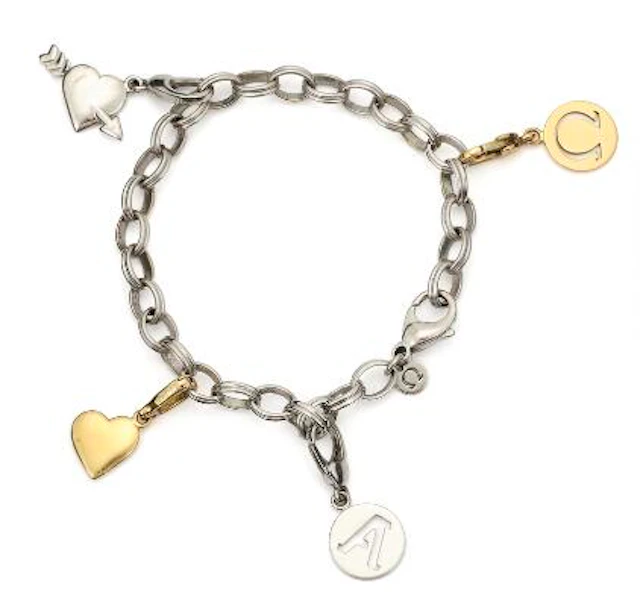 Omega: A bracelet of 18k white gold and gold set with four pendants.