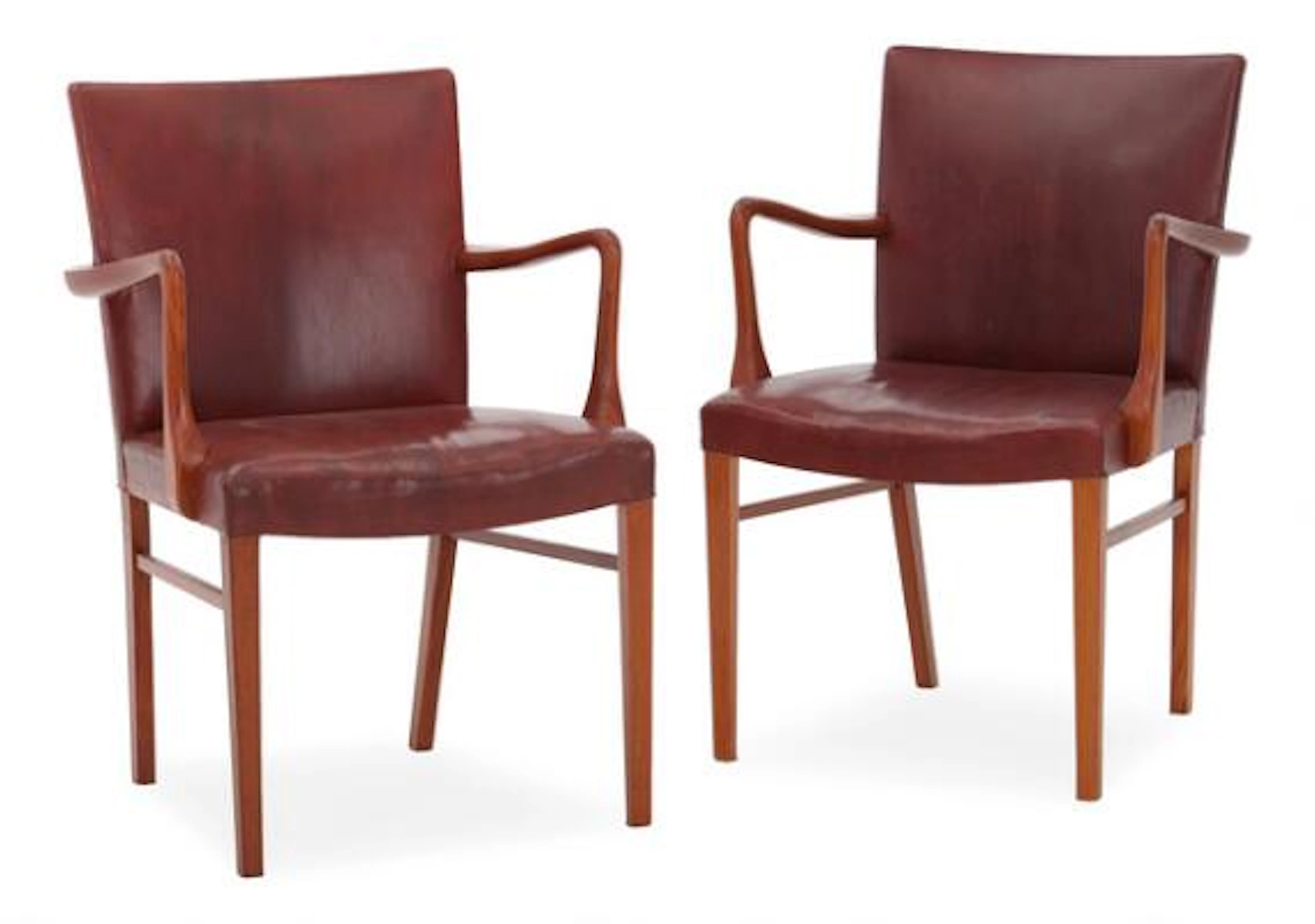 Danish furniture design: A pair of teak armchairs. Seat and back upholstered