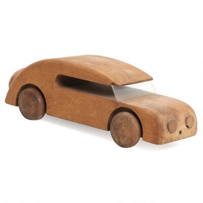 Kay Bojesen: “Automobil Sedan”. A beech wood car with plastic shade.