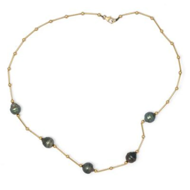 A pearl necklace set with five baroque Tahiti pearls, mounted in 18k