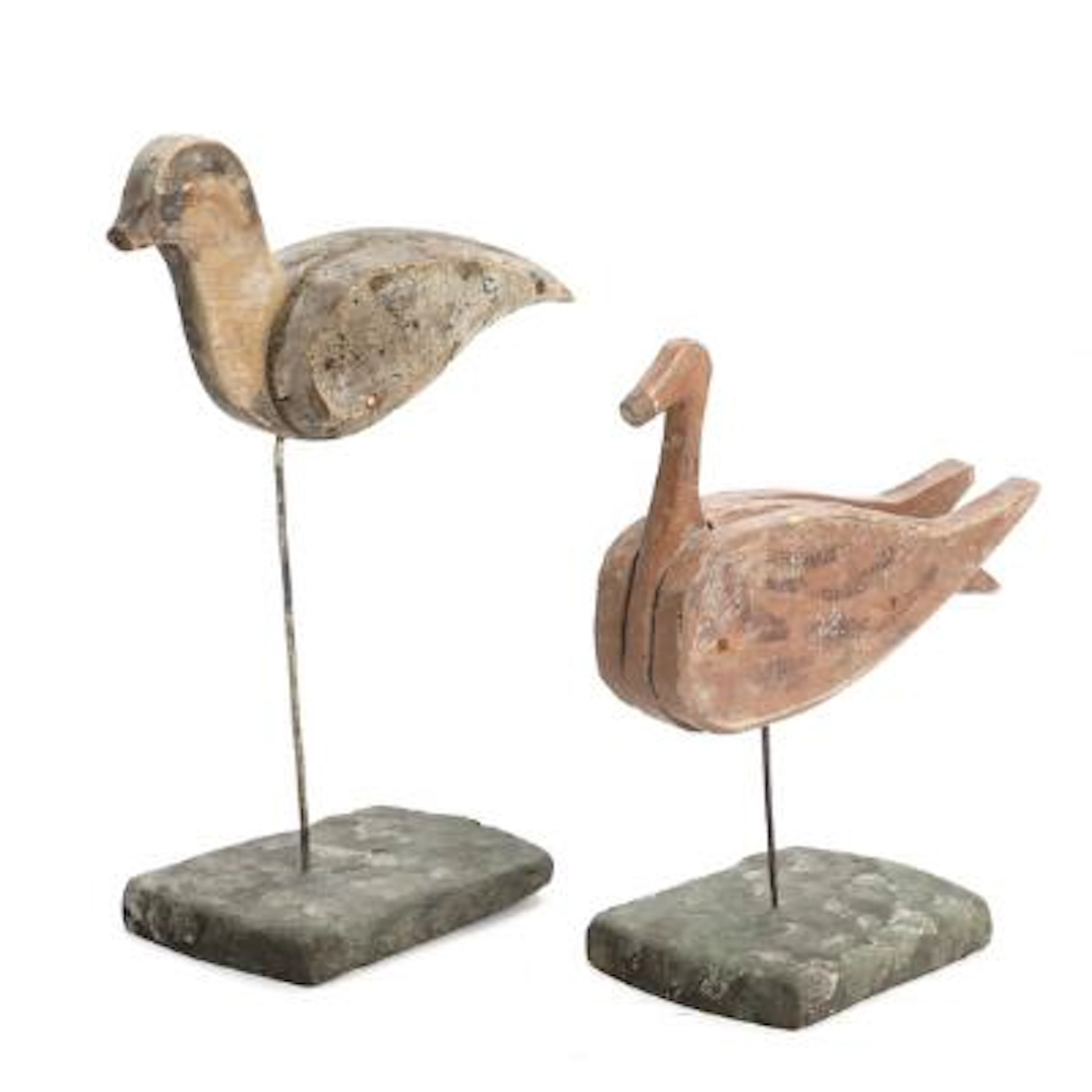 A pair of hand-carved decoy birds. Circa 1900. H. 40. W. 32 cm. H.