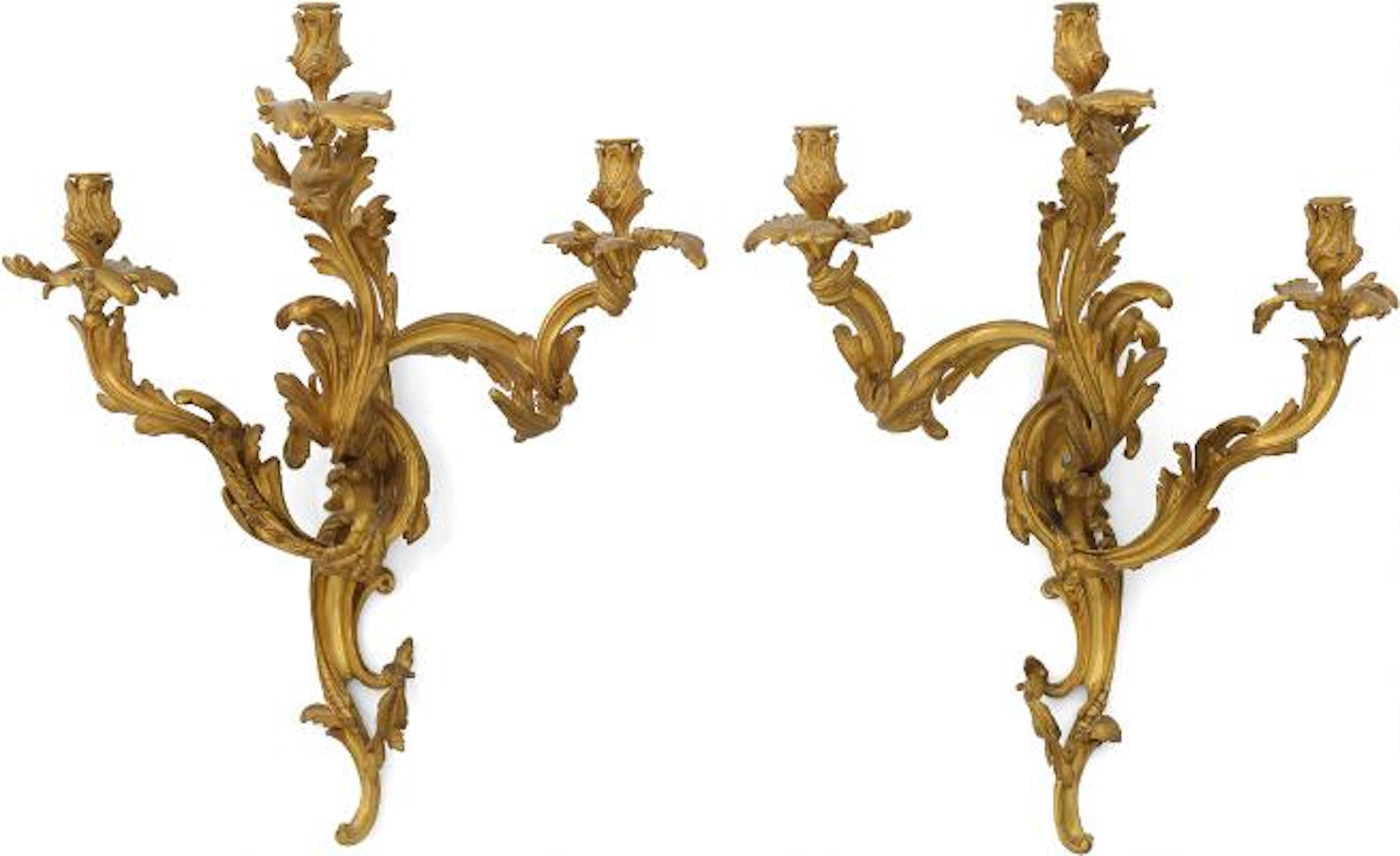 A pair of large French Napoleon III wall sconces of gilded bronze.