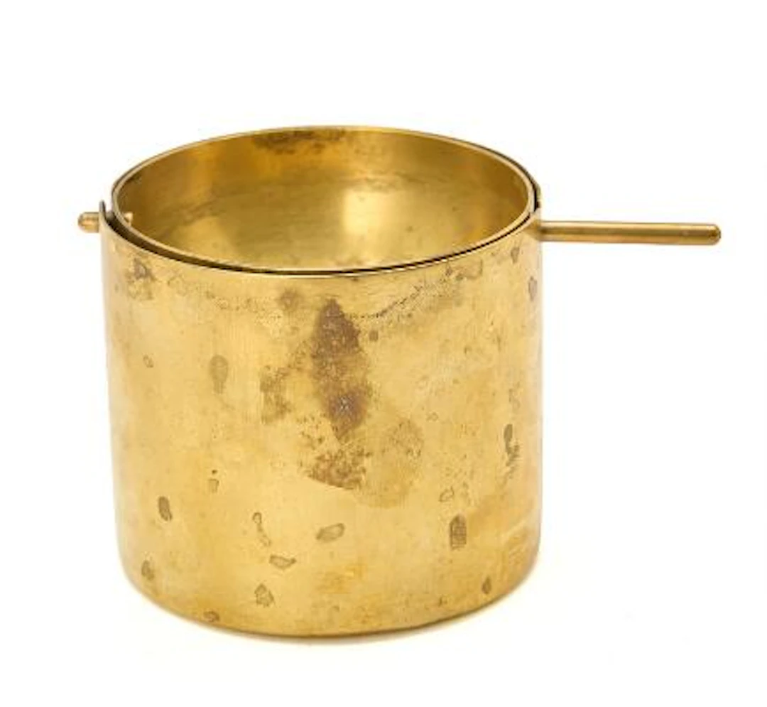 Arne Jacobsen: "Cylinda-line". Ashtray of patinated brass. Made by