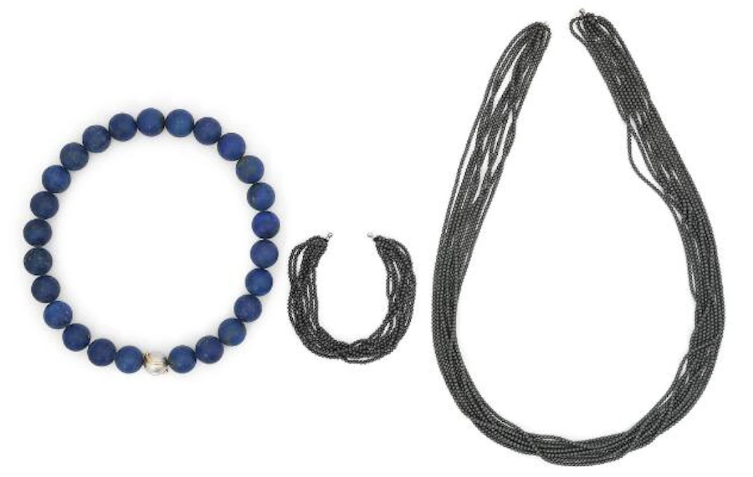 Ole Lynggaard: "Smile" clasp of 14k white gold and gold set with two