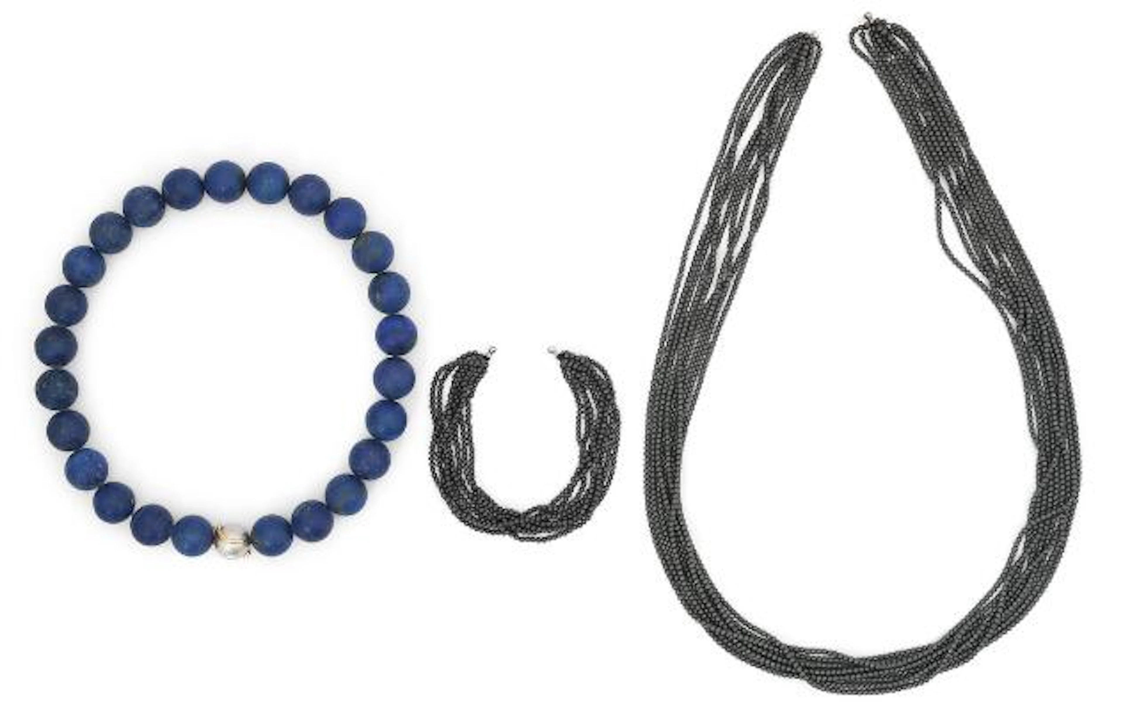 Ole Lynggaard: "Smile" clasp of 14k white gold and gold set with two
