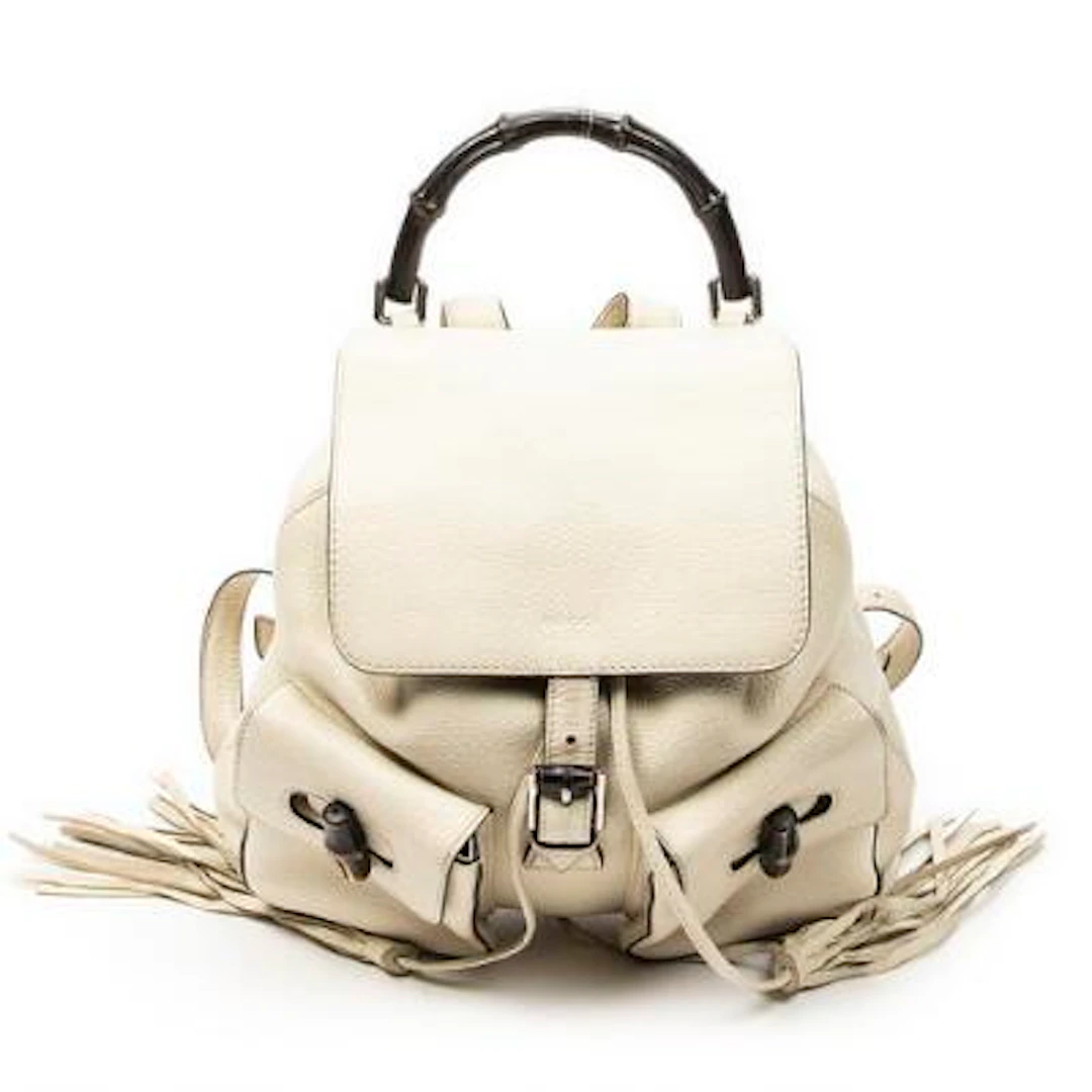 Gucci: A "Medium Bamboo Tassel Backpack" of light leather with silver-tone