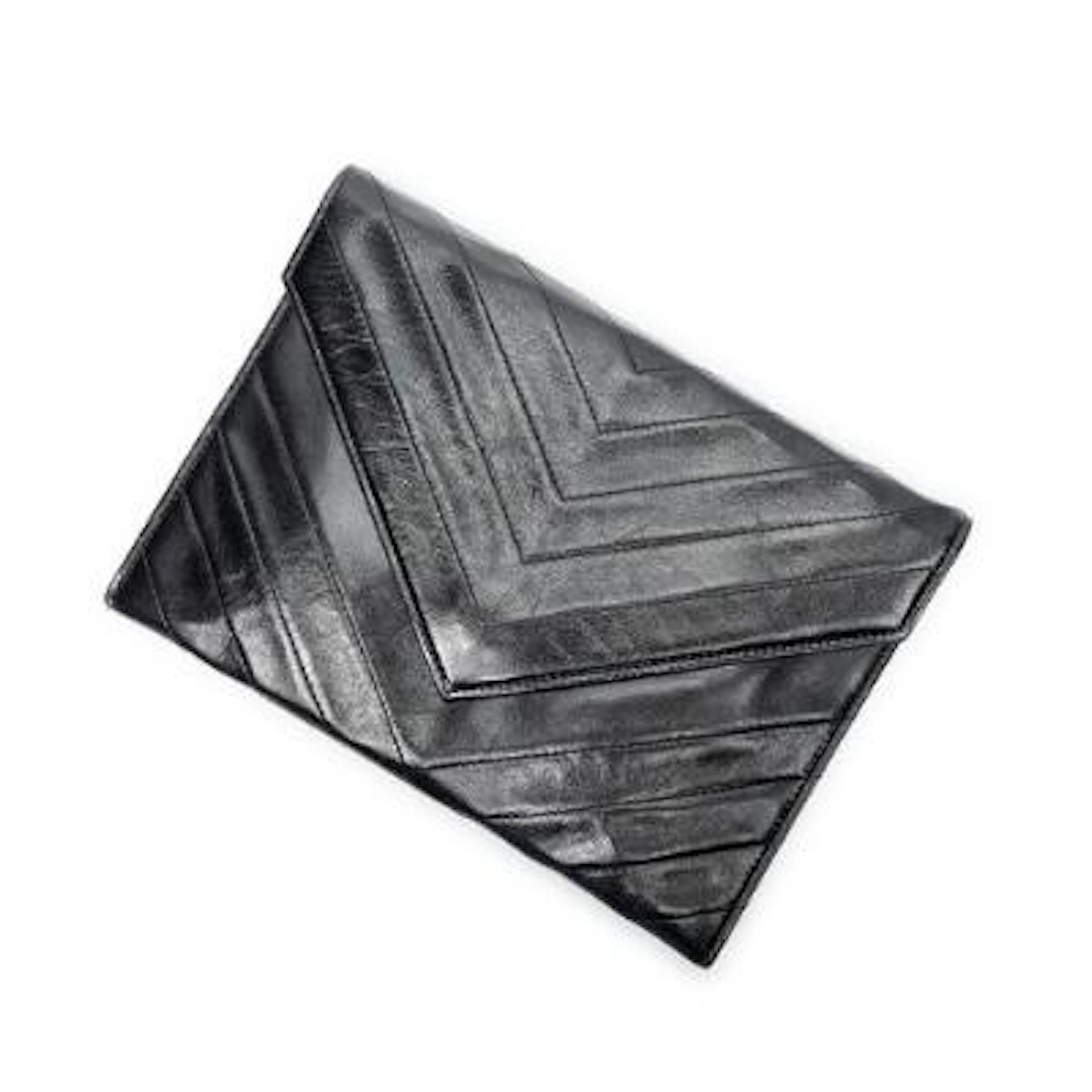 Yves Saint Laurent: A "Vintage Envelope Clutch" in black quilted leather