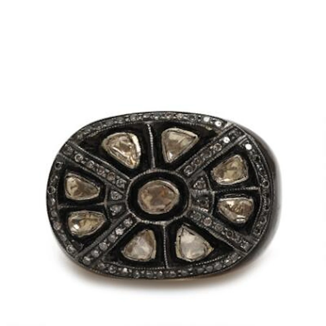 An agate and diamond ring set with single-cut and fancy-cut diamonds