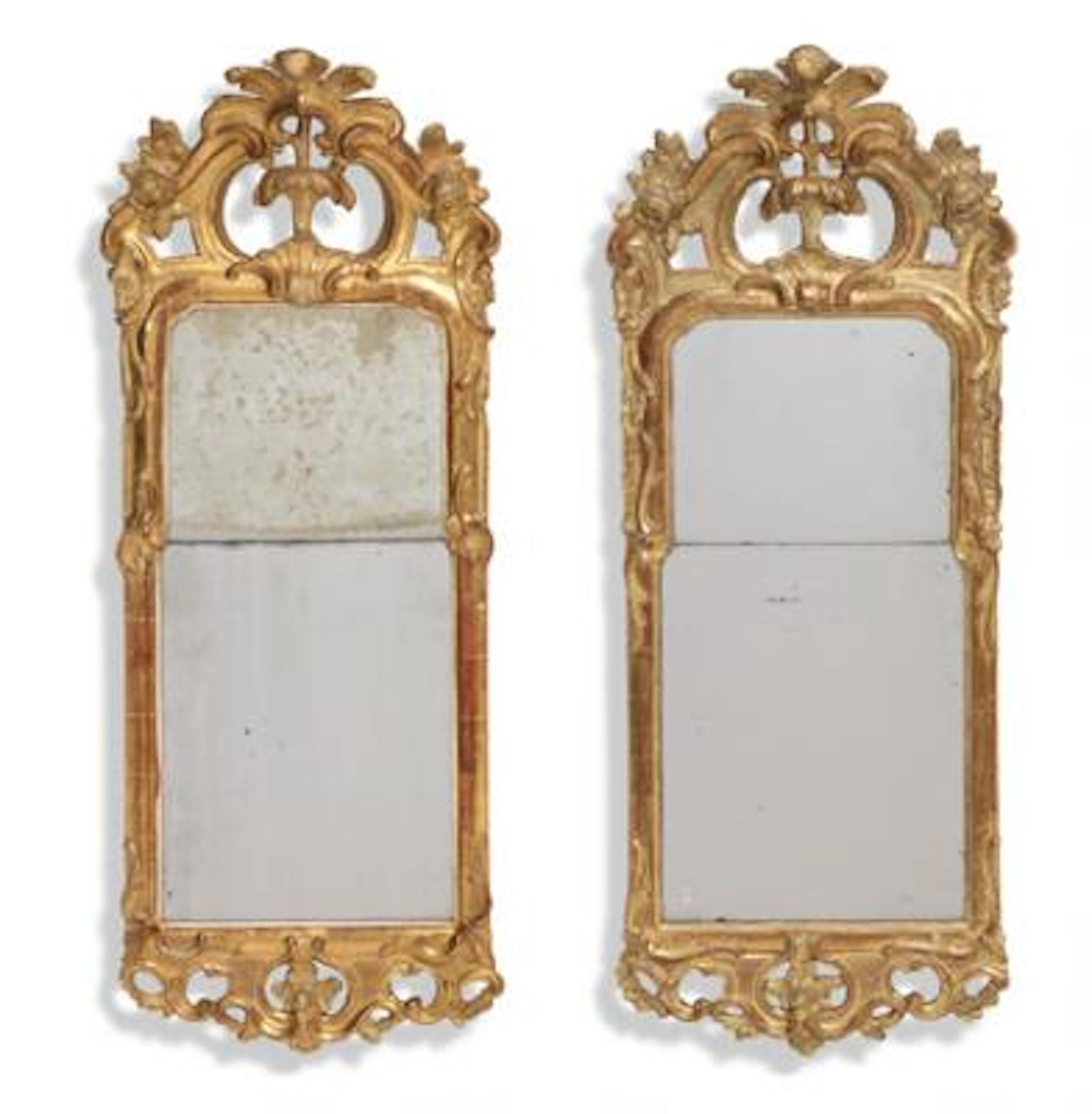 A near pair of Swedish transition giltwood mirrors, by Samuel Bomansson