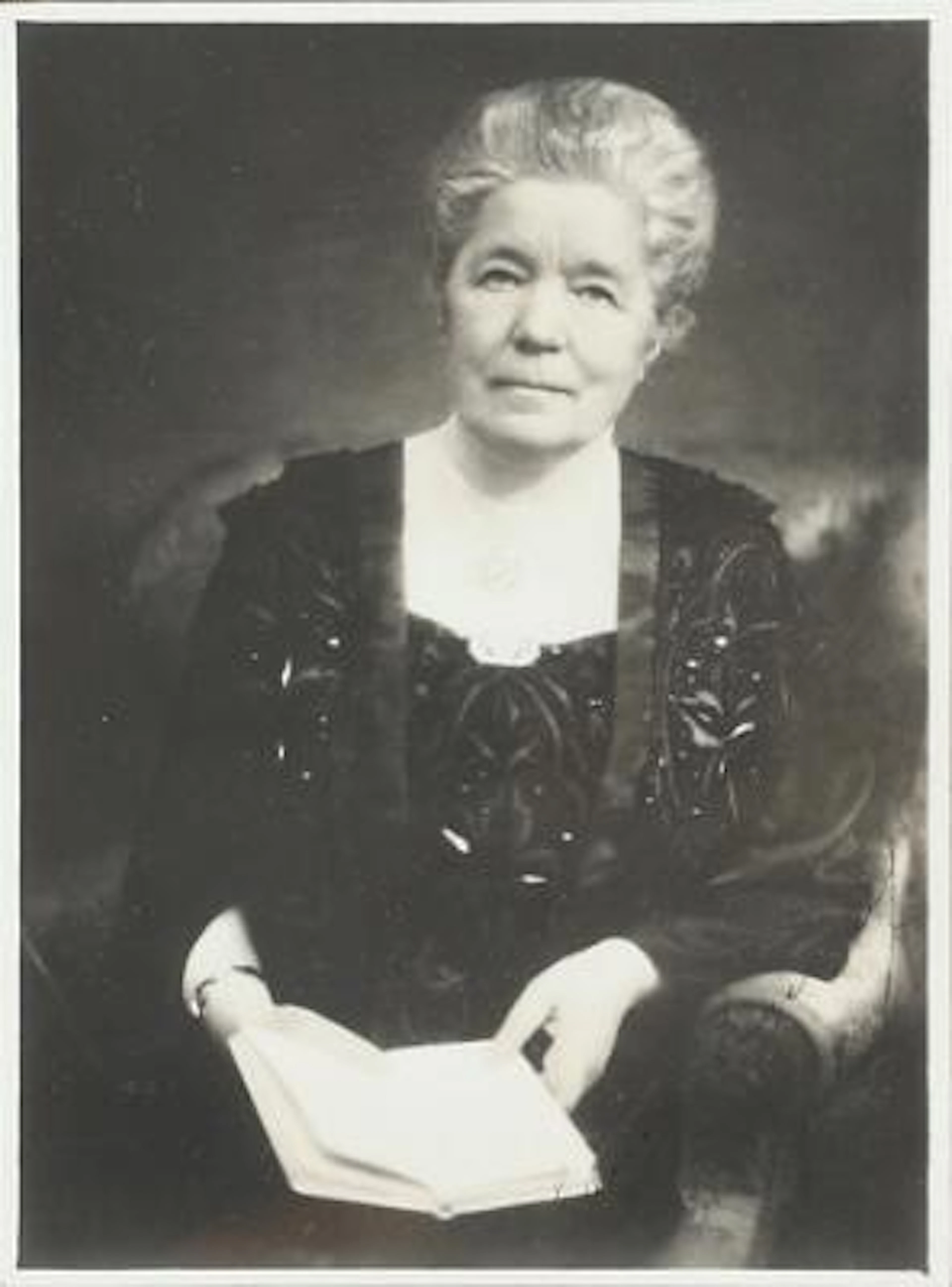 Two signed black-and-white silver gelatin portrait photographs of