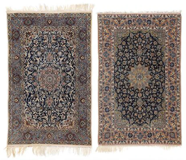 Two Persian Isfahan rugs. Medallion design on a blue field. 107 x