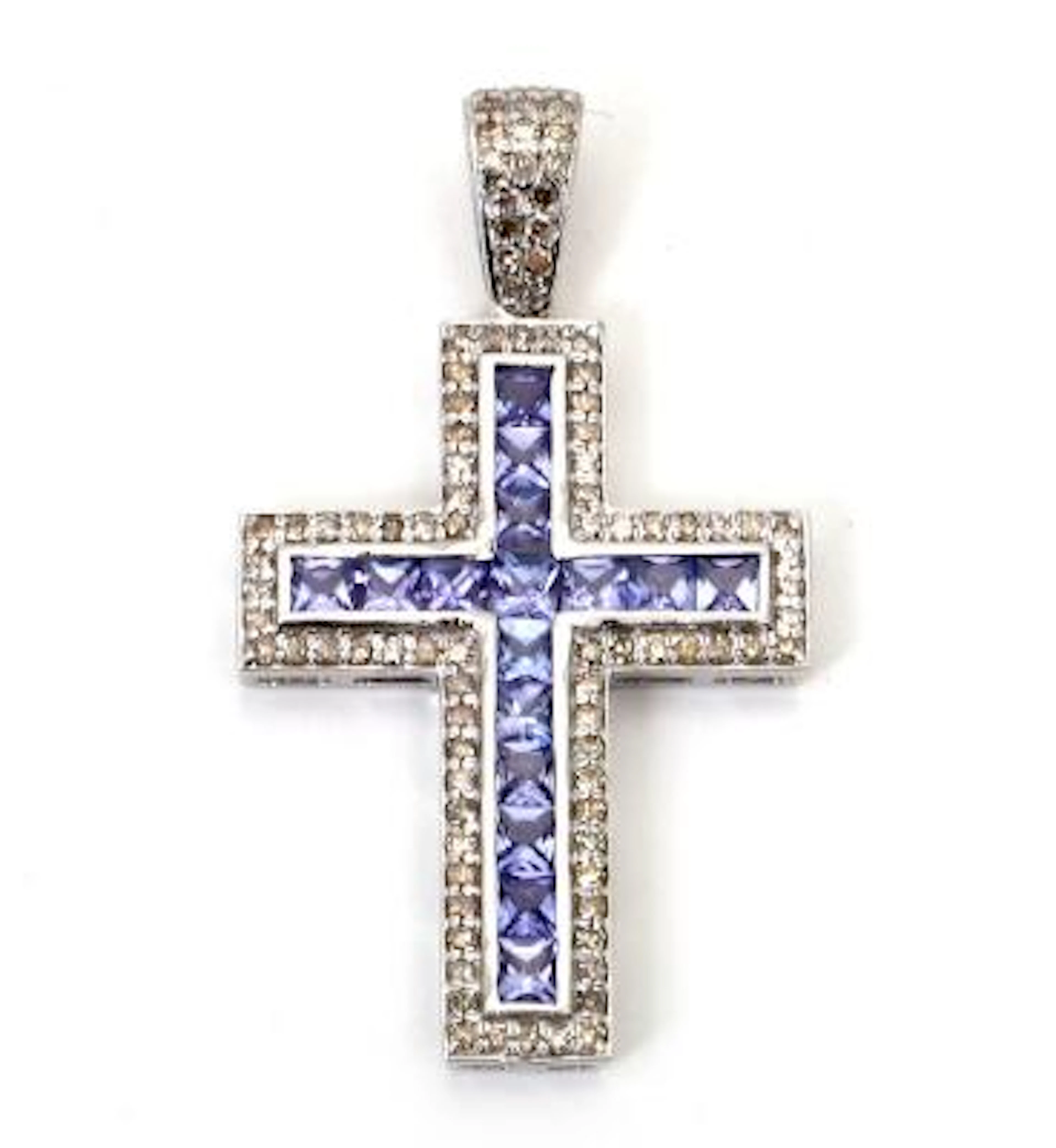A tanzanite and diamond pendant set with numerous tanzanites and diamonds