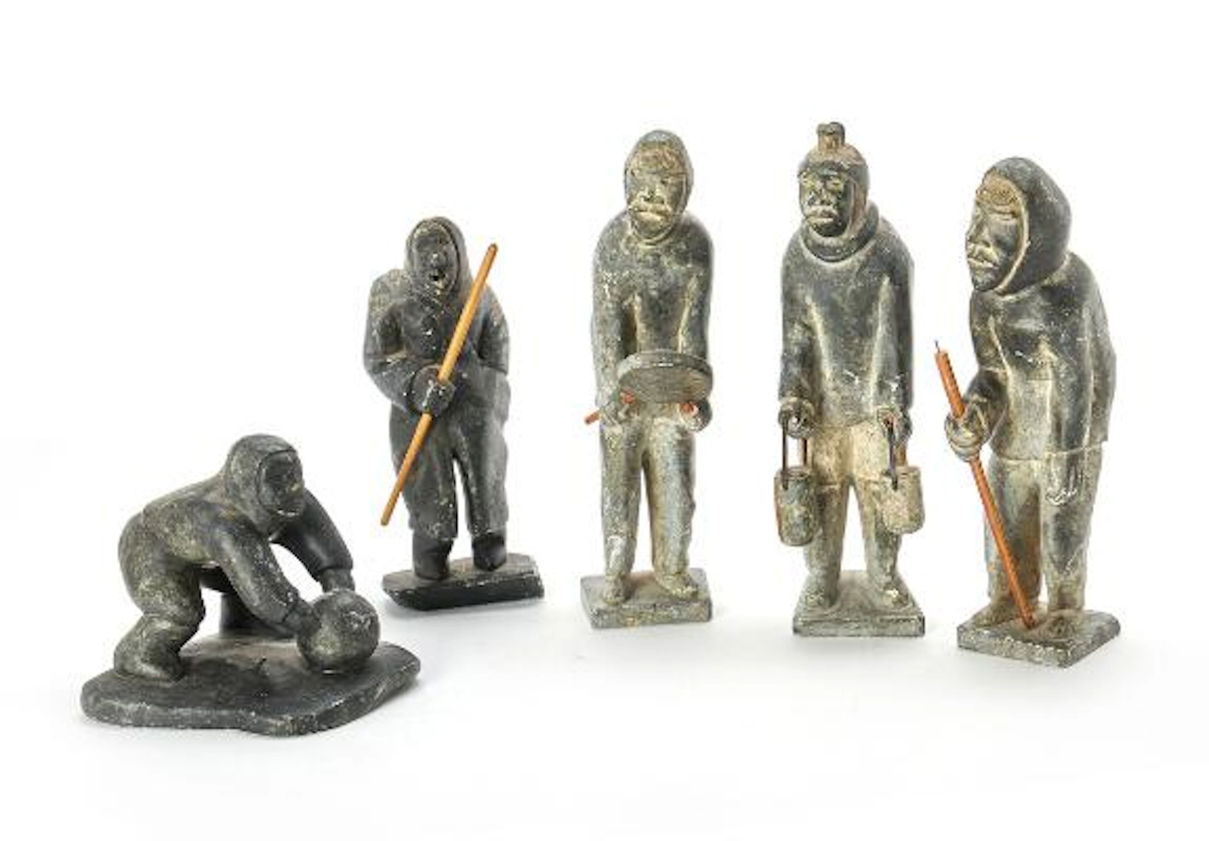 Karl Petrussen, et al: Five Greenlandic figures of carved soapstone.