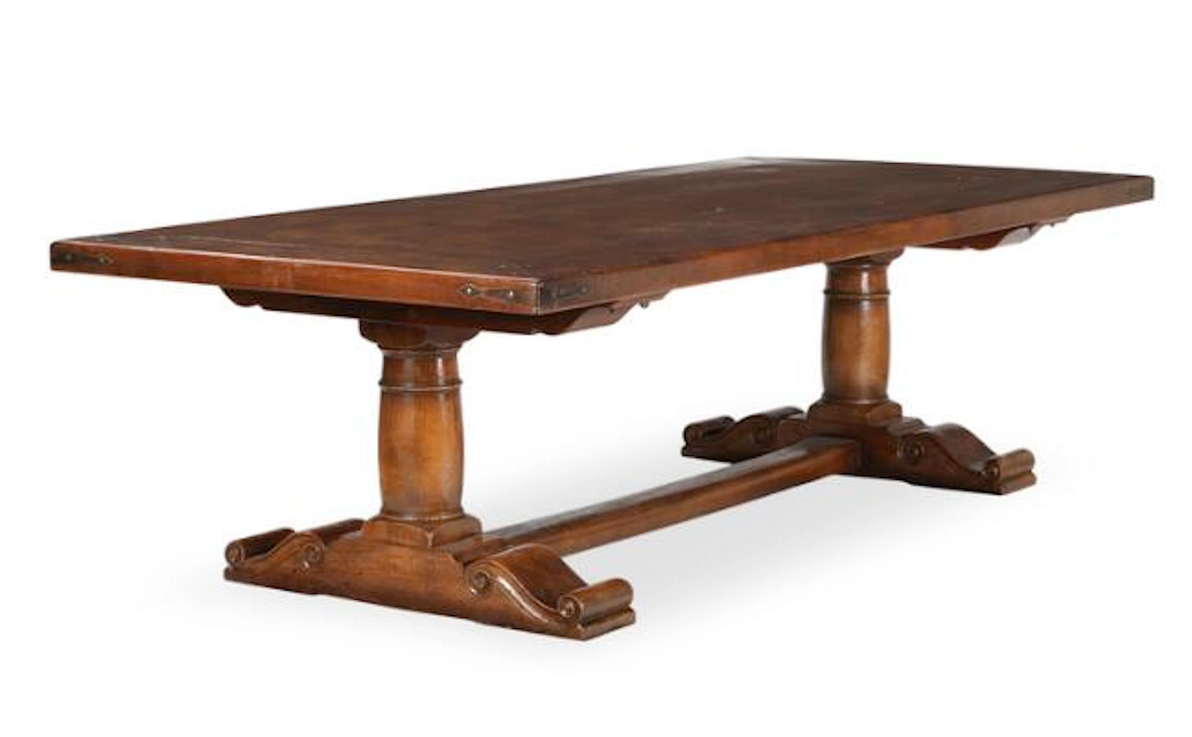 A massive walnut Refectory table, carved with voluttes. Louis XIII