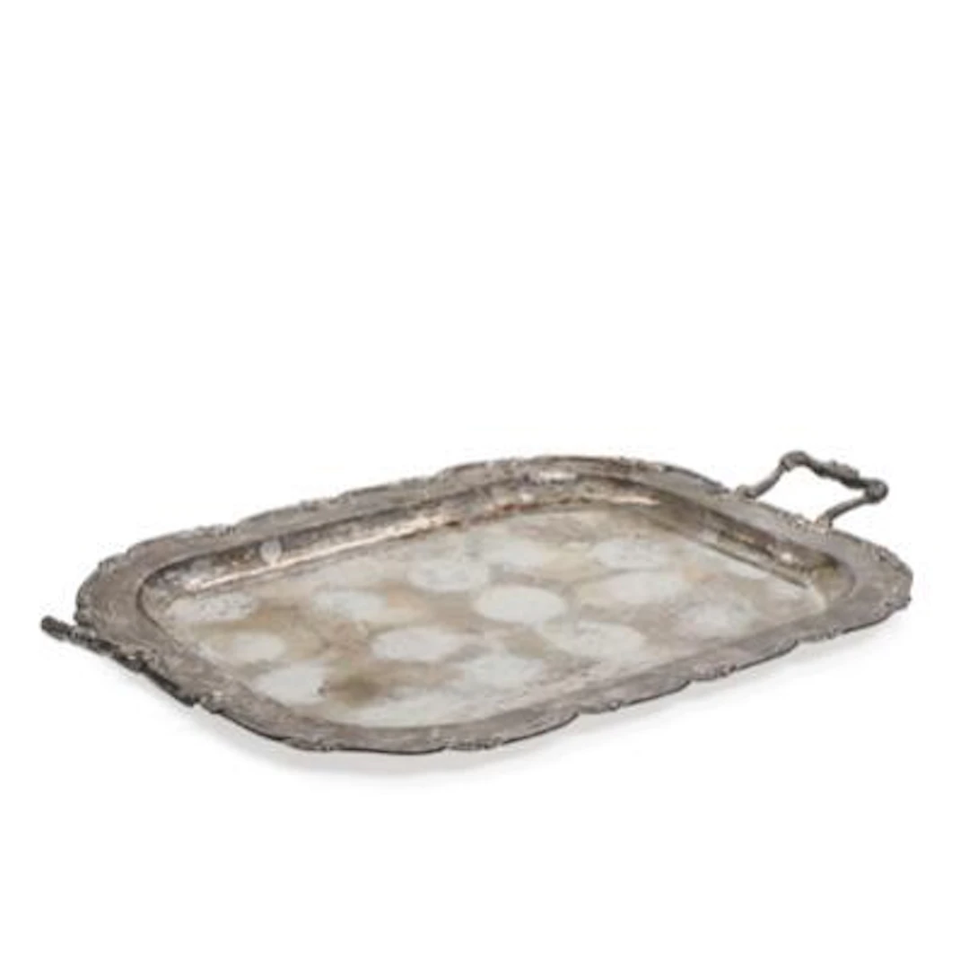 Large Peruvian serving tray of sterling silver, rim adorned with flowering