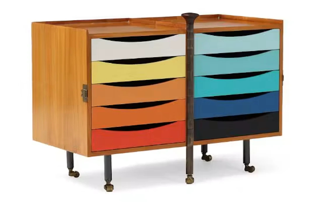 Finn Juhl: A low cherrywood chest of drawers, wengé top handle. Inside