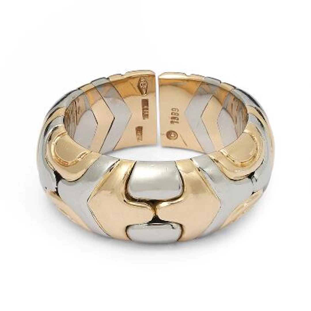 Bulgari: A "Alveare" ring of 18k gold and stainless steel. Weight
