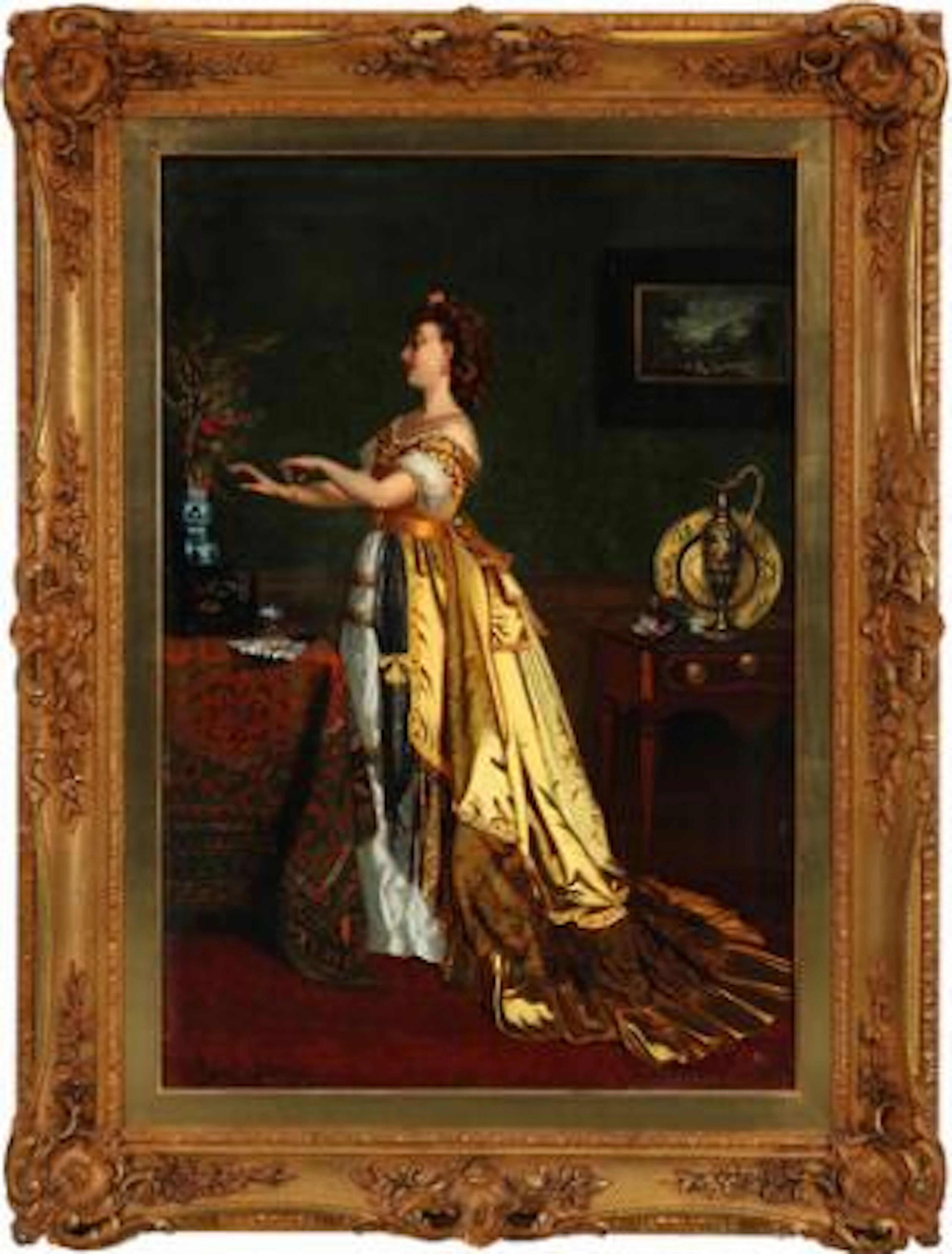 Agapit Stevens: An interior with a woman in a yellow dress. Signed