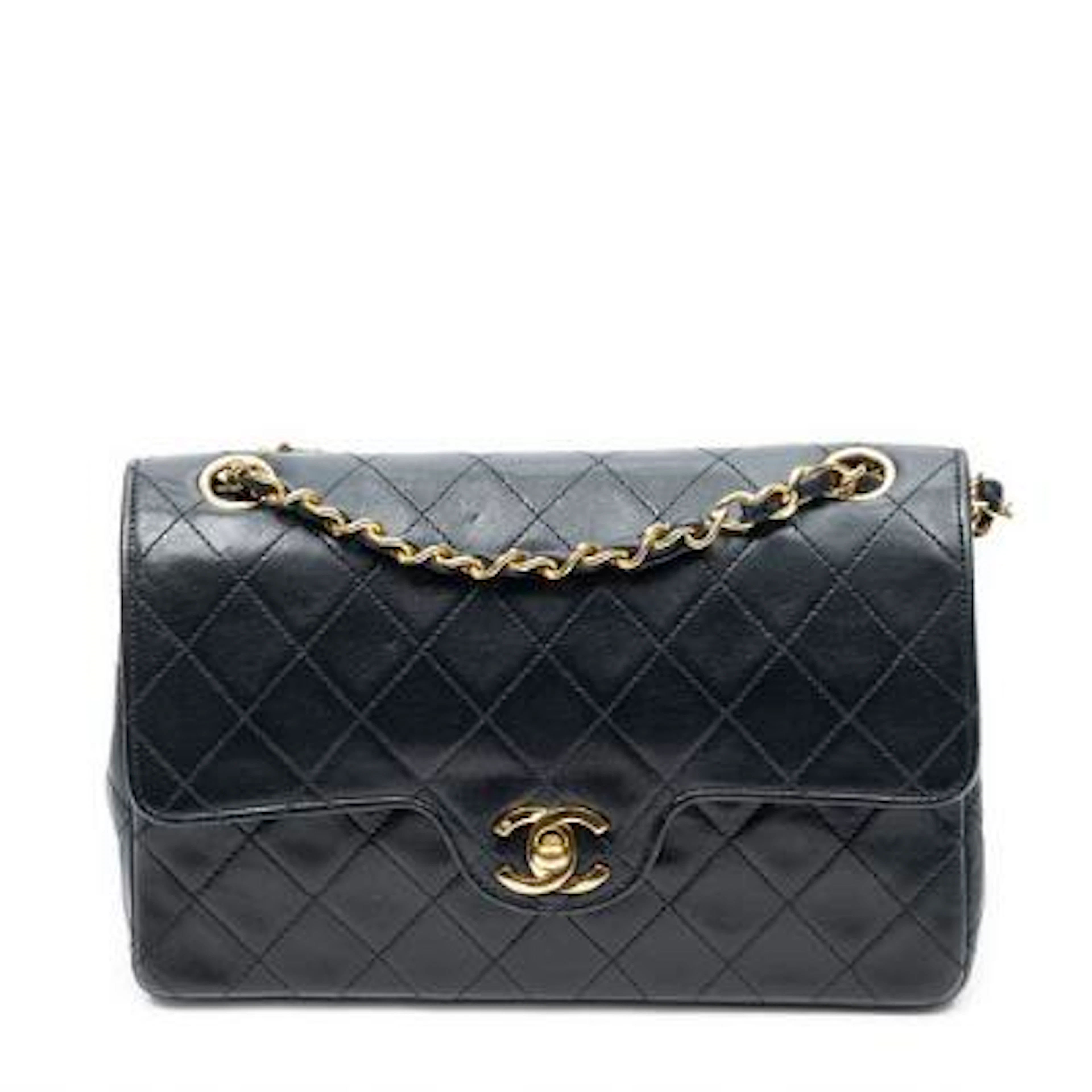 Chanel: A "Small Curved Double Flap" bag in black quilted leather