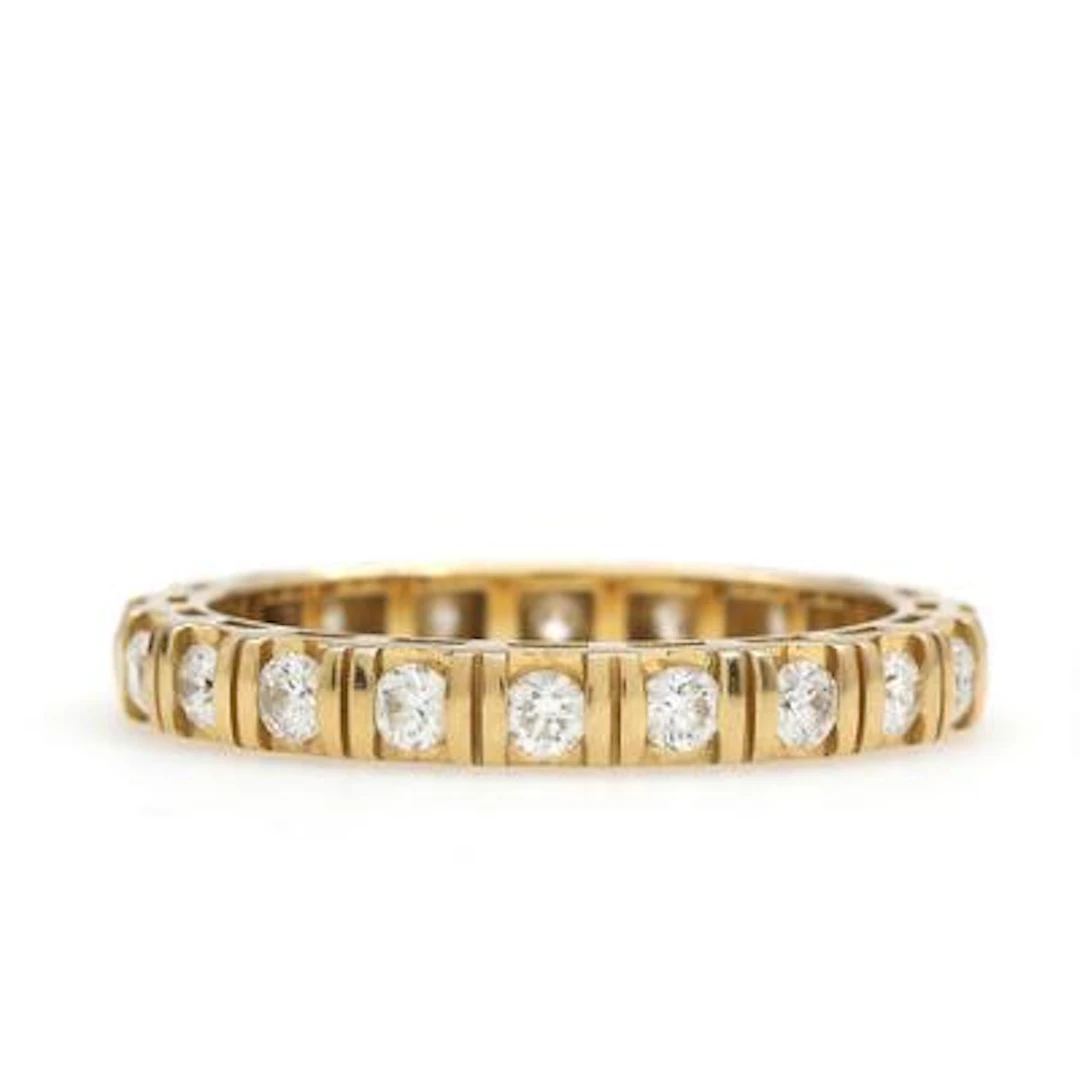 Crieri: A diamond ring set with numerous brilliant-cut diamonds weighing