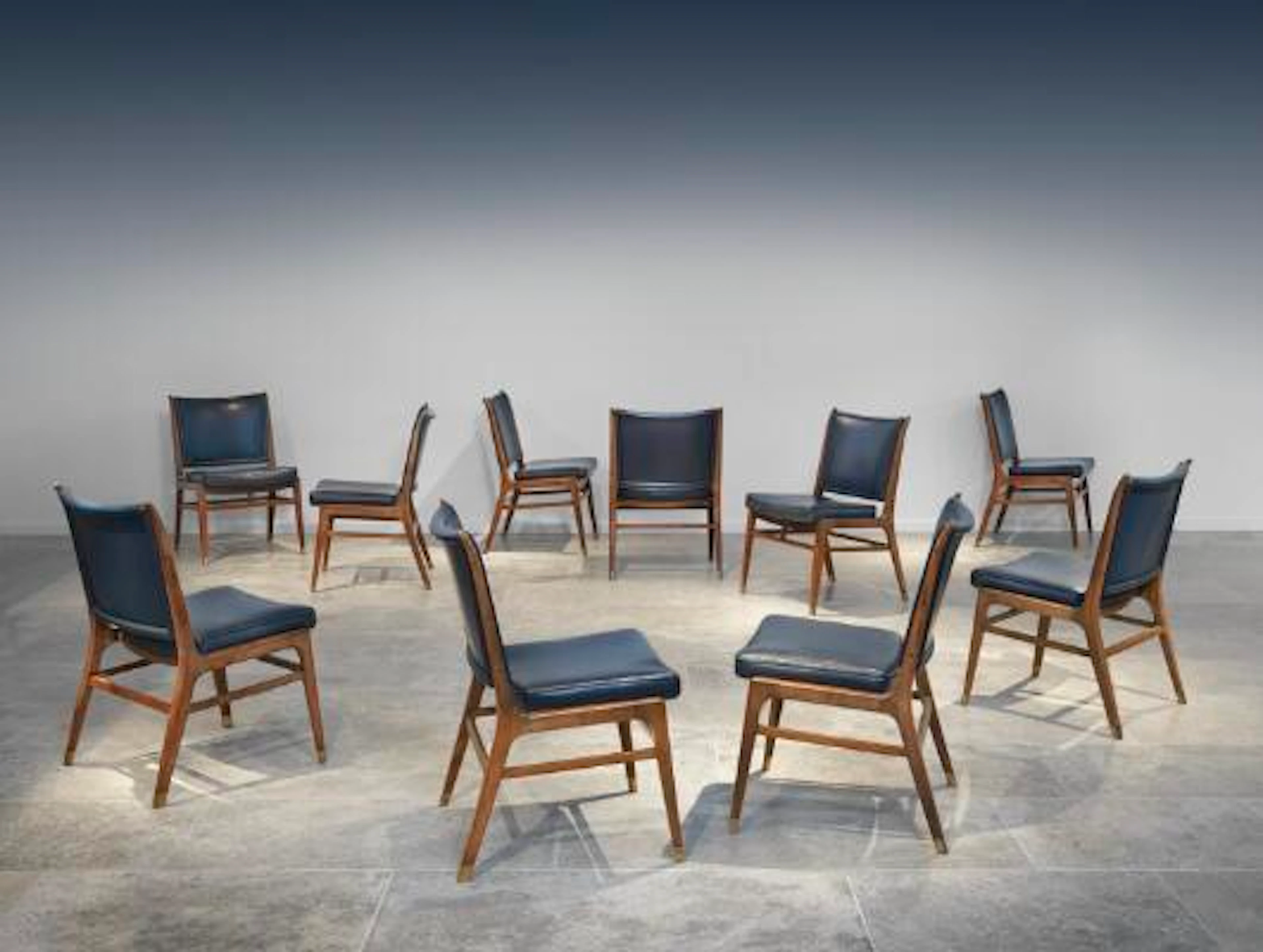 Finn Juhl: “FJ 42”. A very rare set of ten Cuban mahogany chairs.