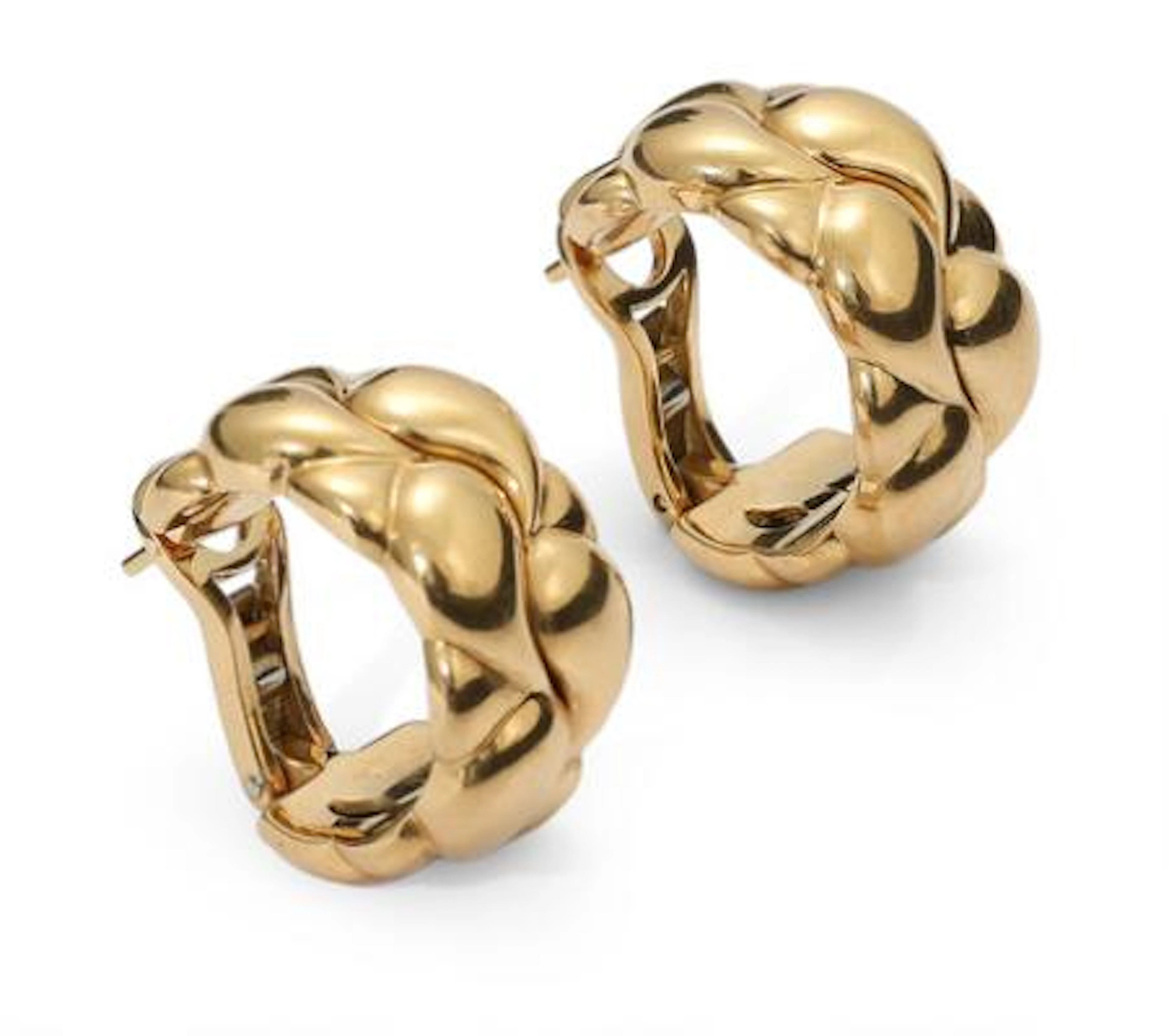 Chopard: A pair of "Casmir" ear pendants of 18k gold. Weight in total