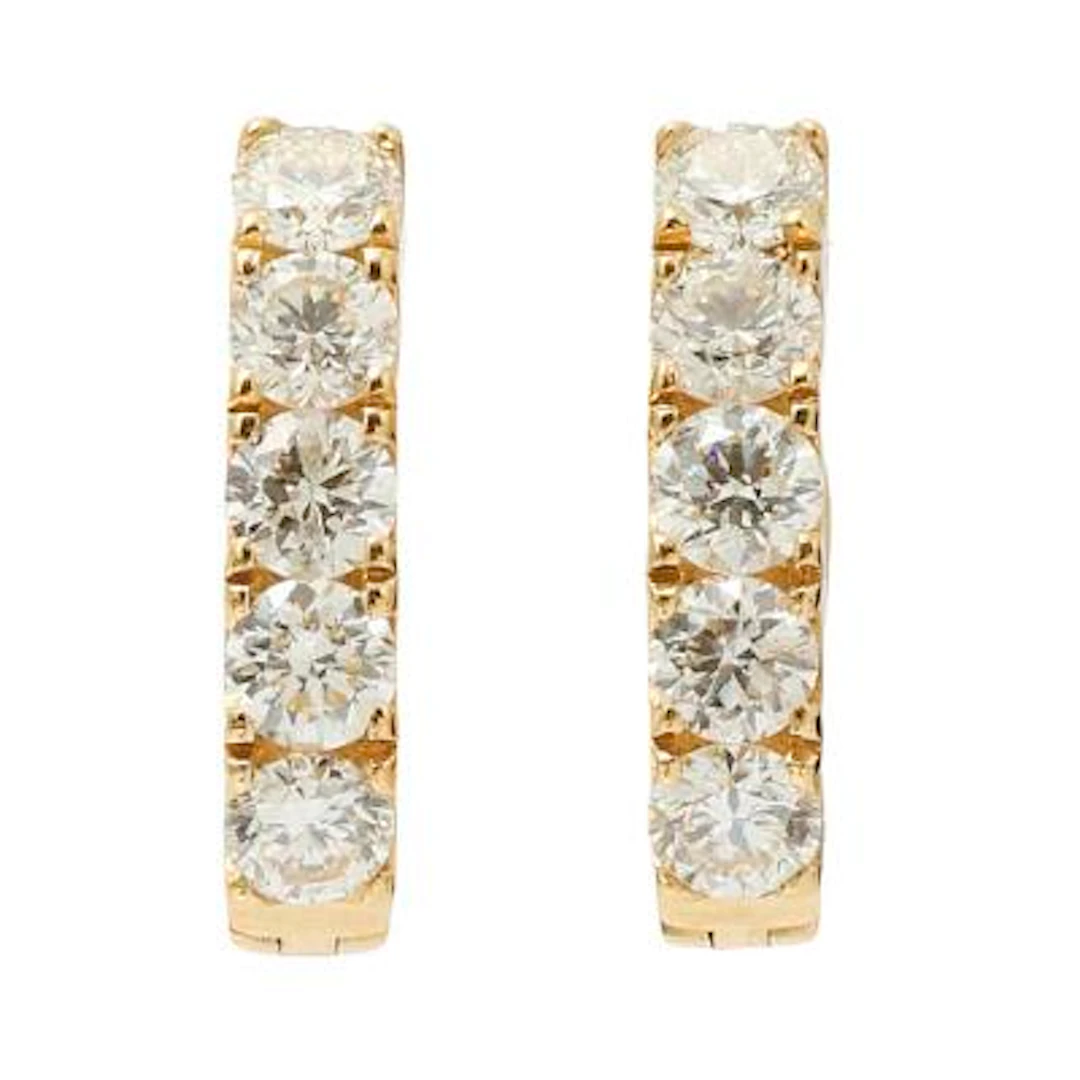 A pair of ear studs set with numerous diamonds mounted in 18k gold.