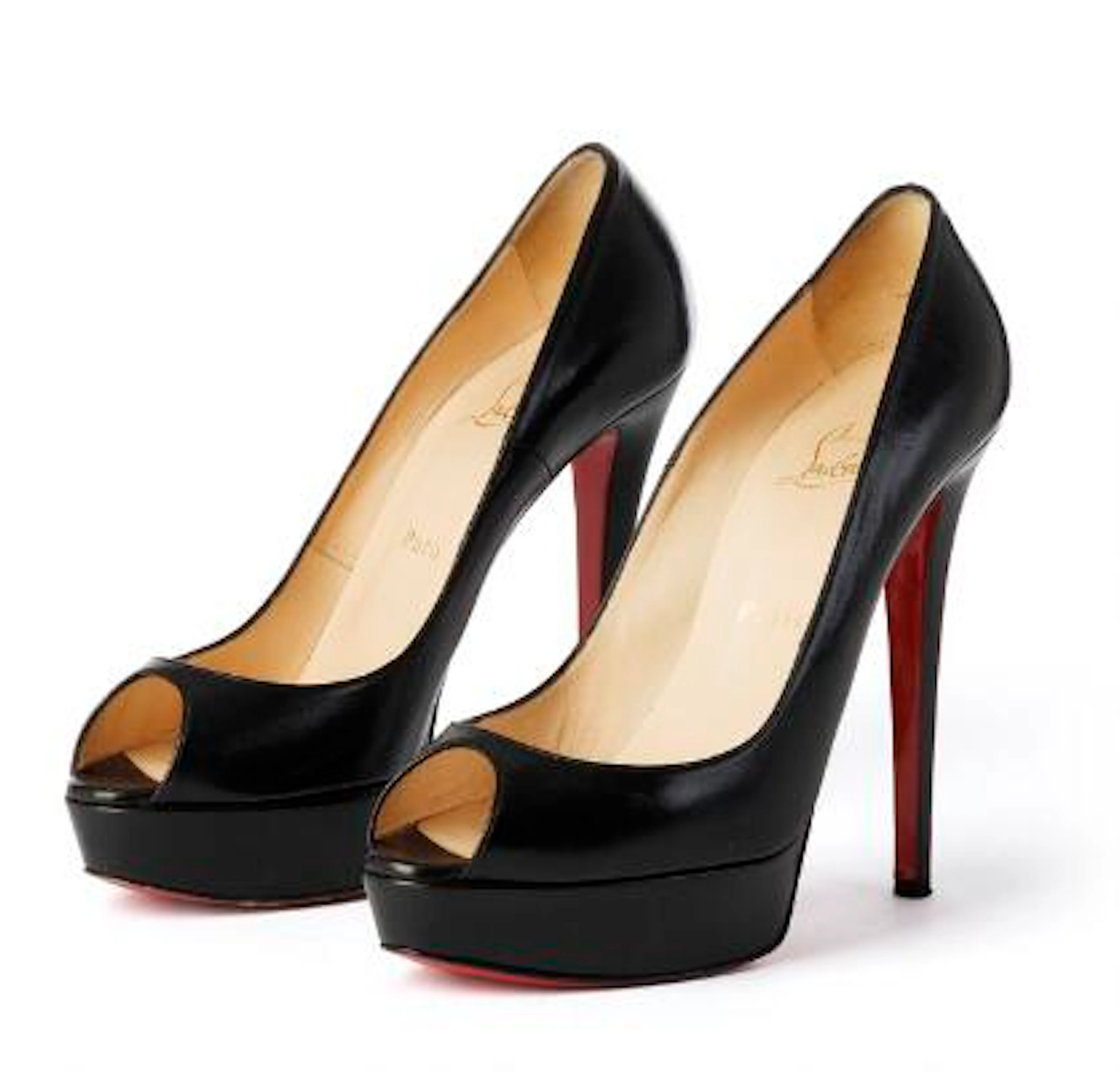 Christian Louboutin: A pair of black stilettos of leather with open