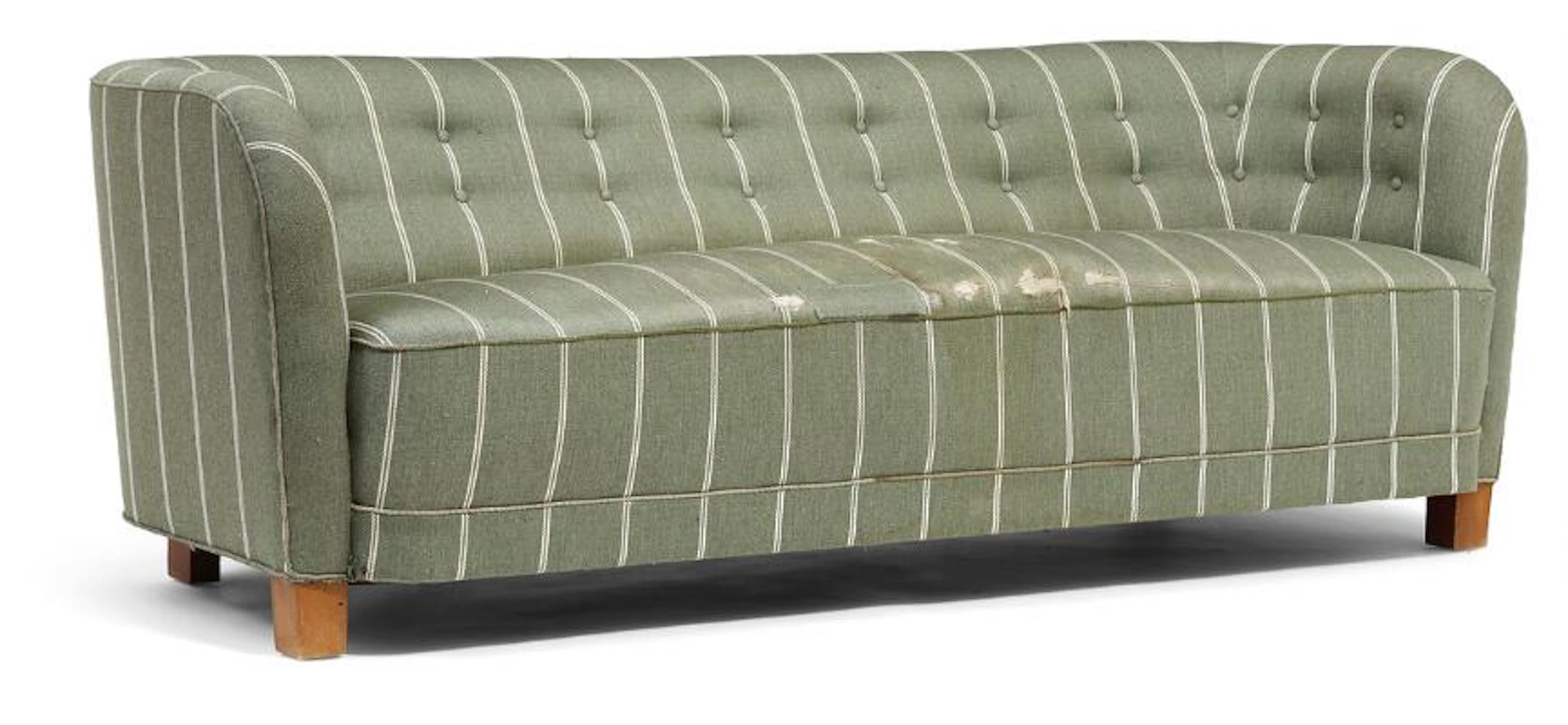 Kaj Gottlob: Three seater sofa with stained beech legs. Upholstered