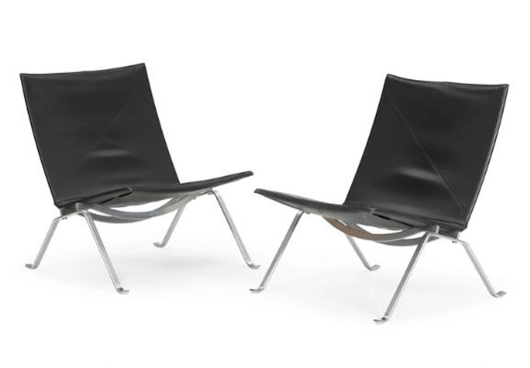 Poul Kjærholm: "PK 22". A pair of easy chairs with steel frame and