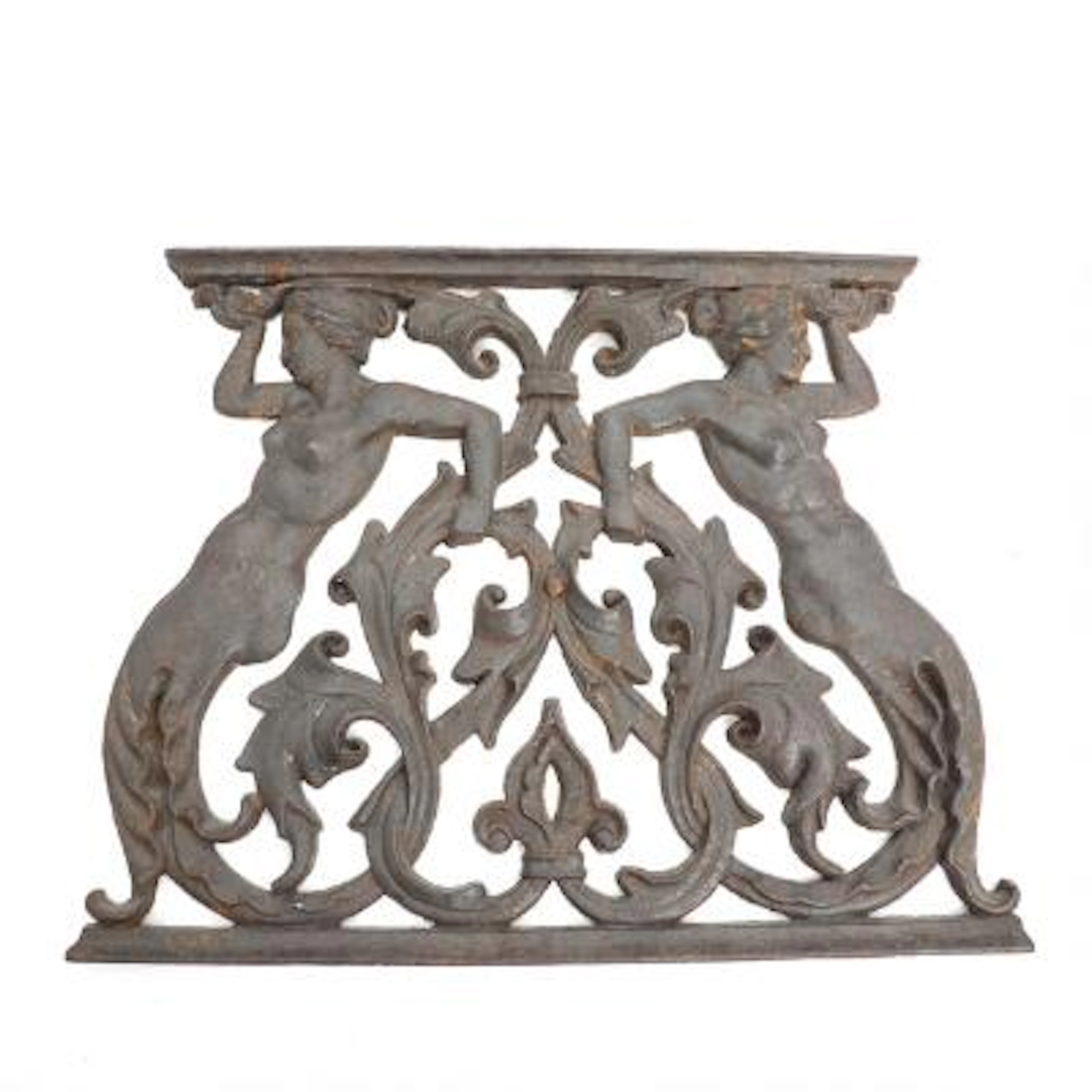 A patinated cast iron fireplace, cast in the shape of mermaids. 19th
