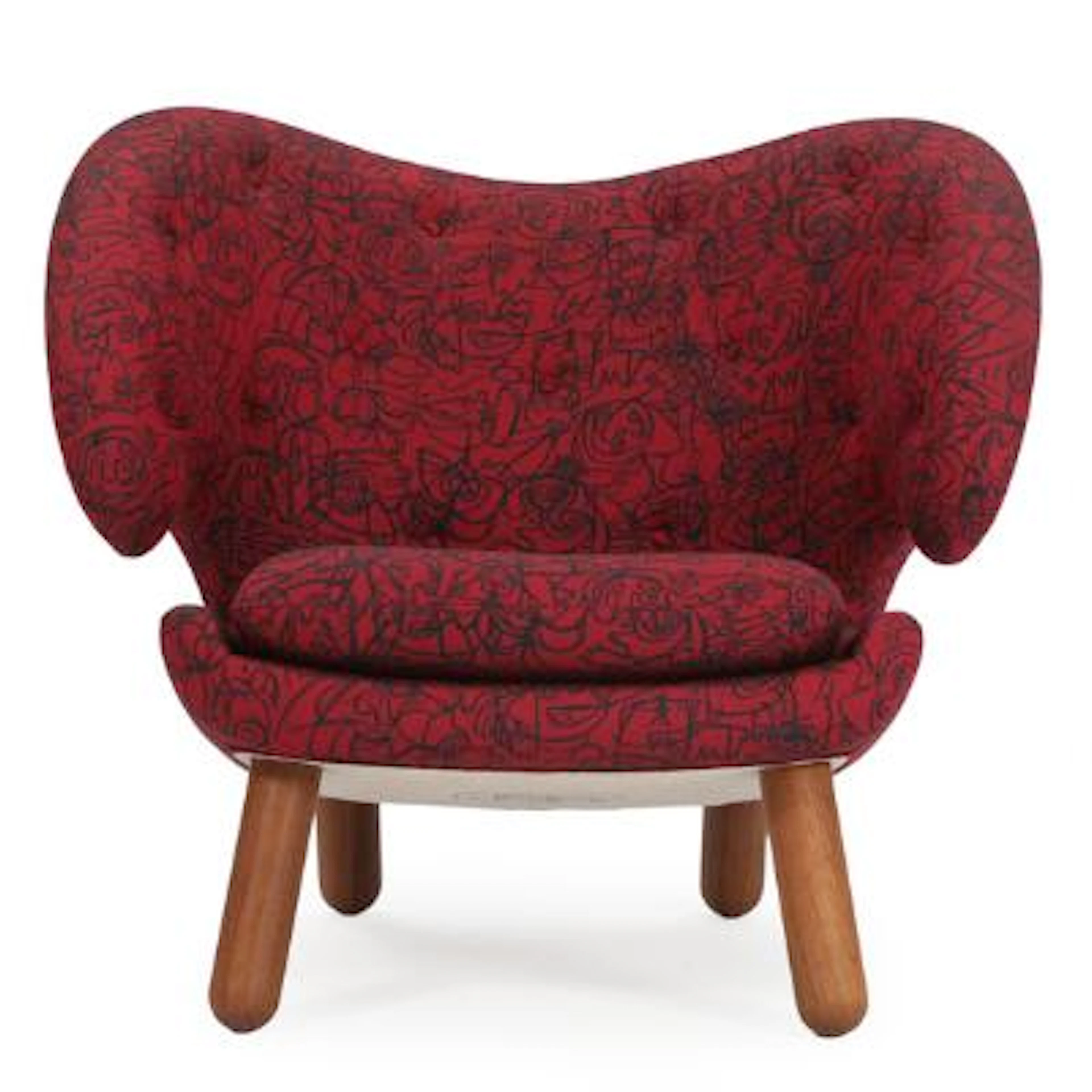 Finn Juhl: “The Pelican”. Easy chair with walnut legs. Seat, sides