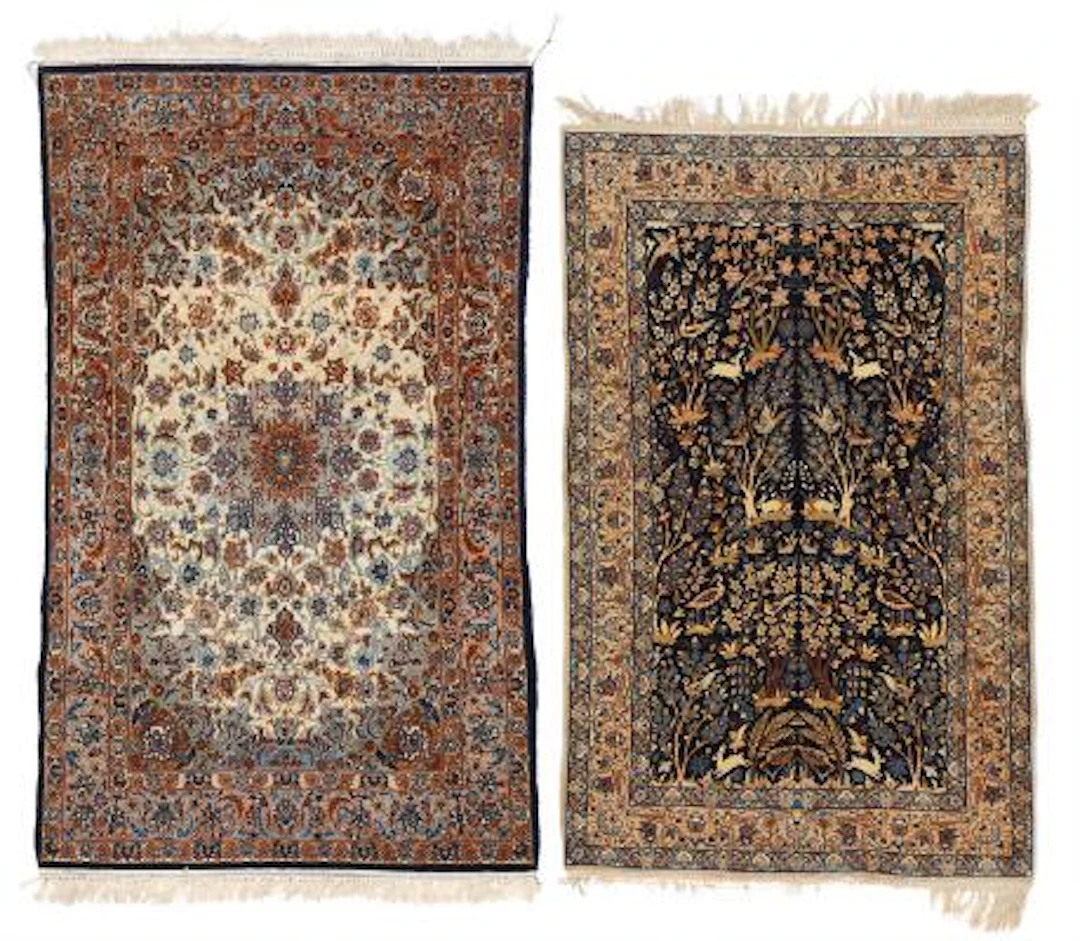 Two Isfahan rugs, Persia. Trees, flowers and animal motifs. Second