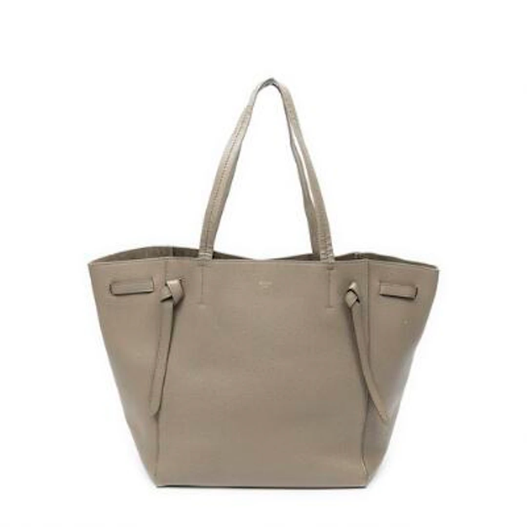 Celine: A "Medium Cabas Phantom" tote bag in taupe leather with twp