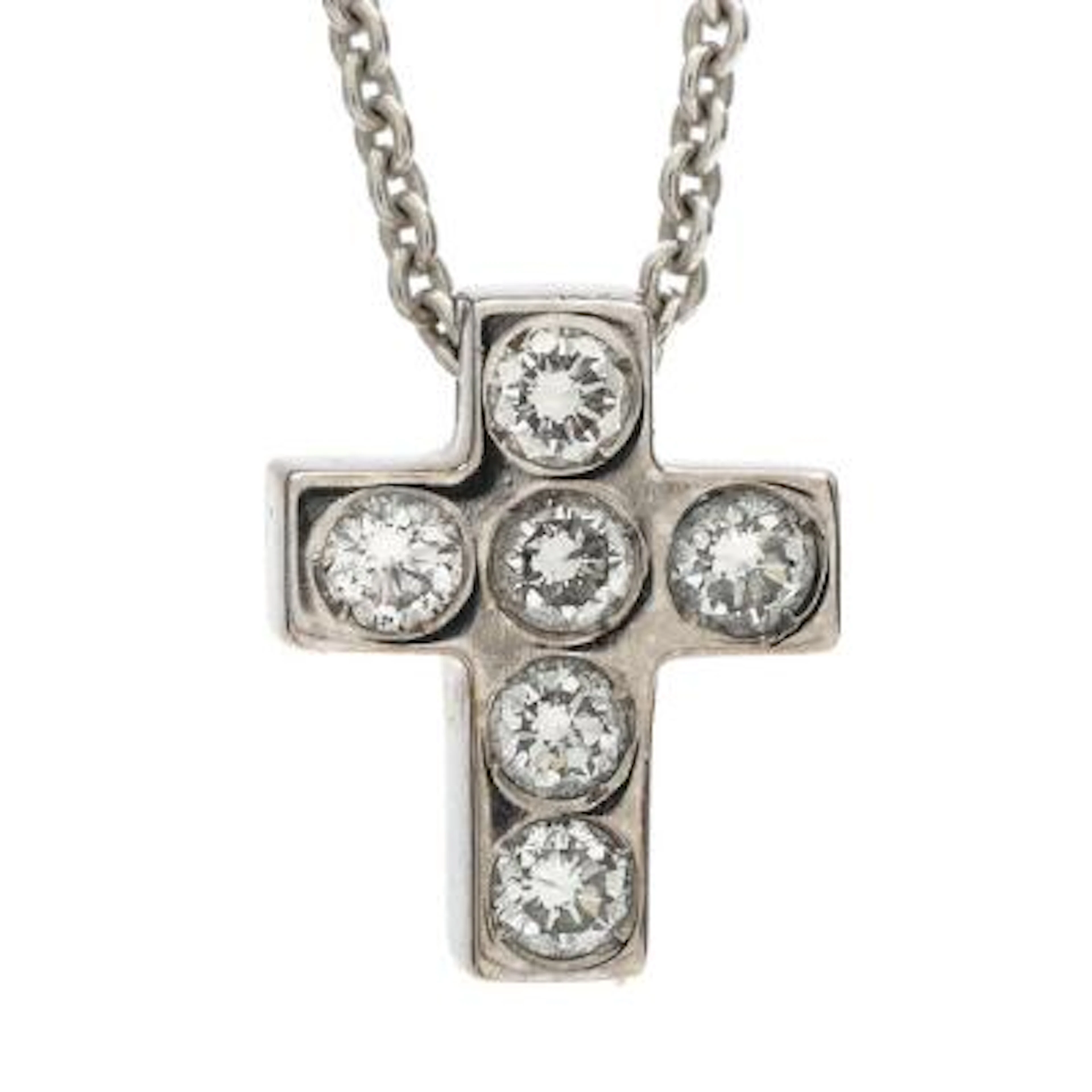 A diamond cross pendant set with brilliant-cut diamonds, mounted in