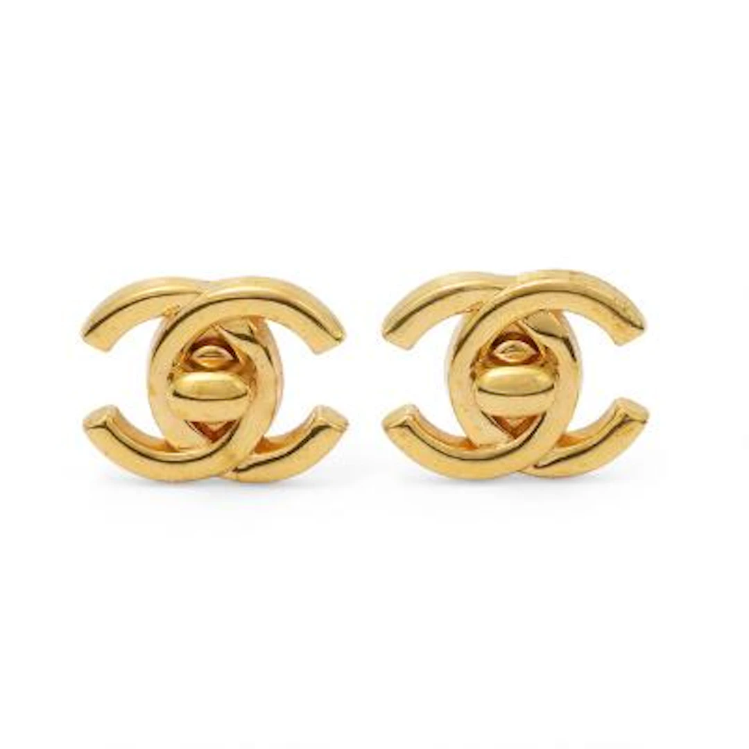 Chanel: A pair of ear clips in the shape of CC logos, mounted in gilded