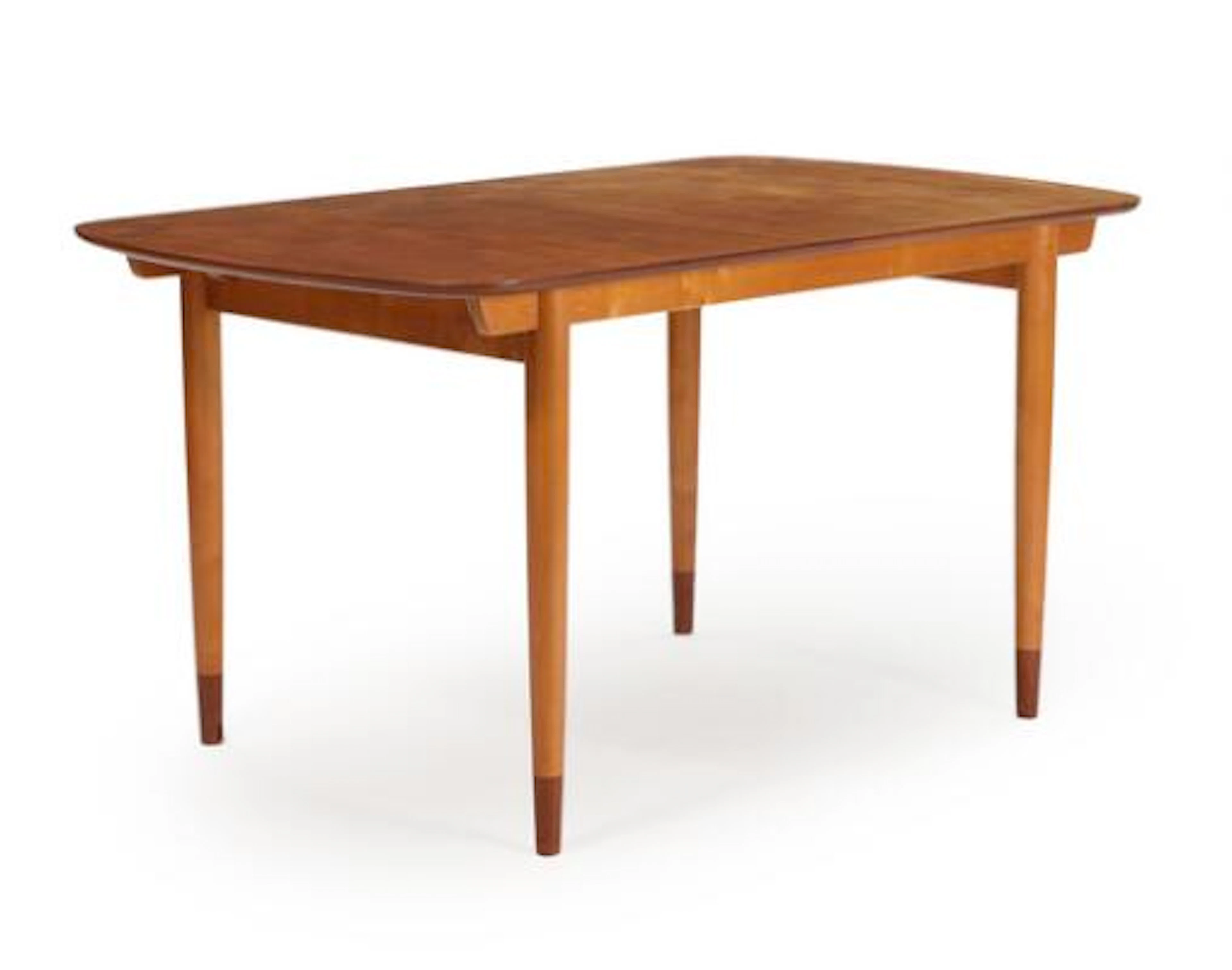 Finn Juhl: Dinning table of teak and beech. Manufactured by Søren