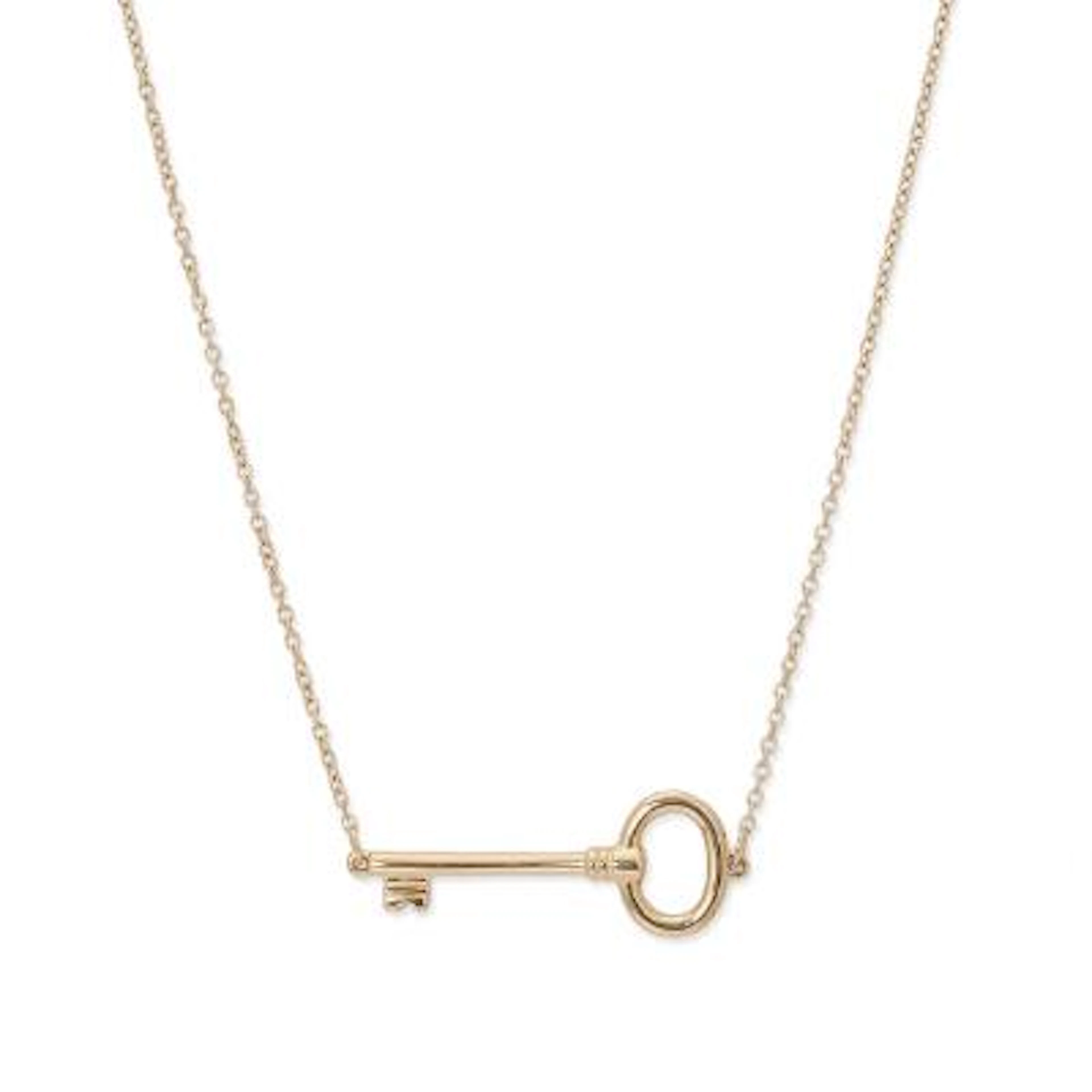 Tiffany & Co.: An "East-West Key" necklace with a key pendant of 18k