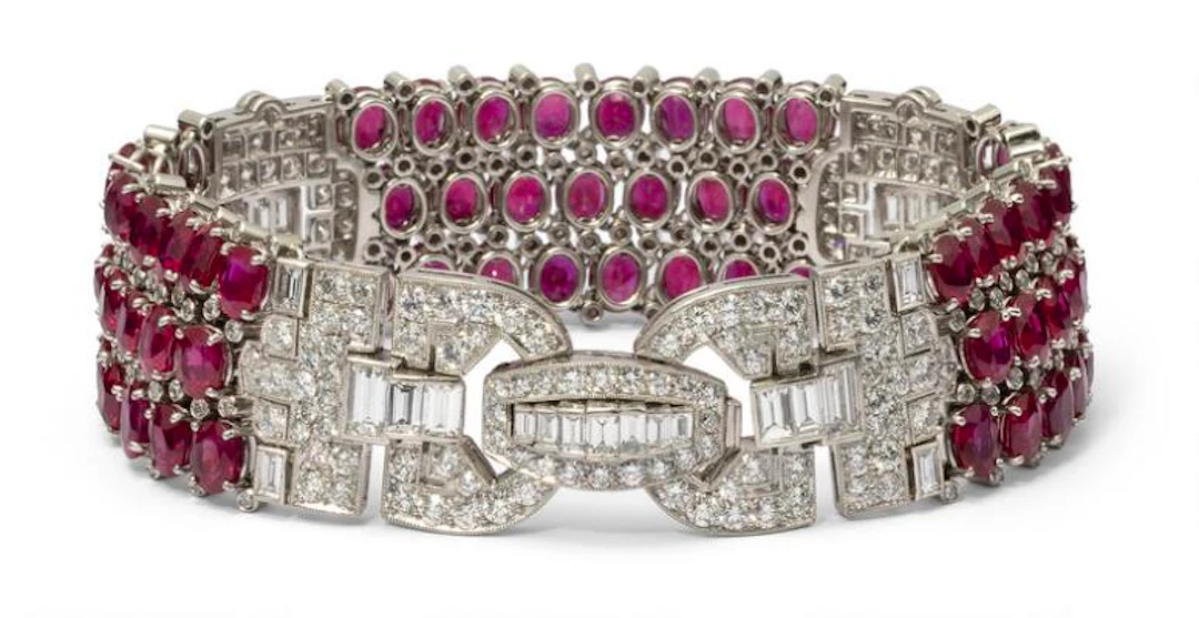 A ruby and diamond bracelet set with numerous rubies and diamonds