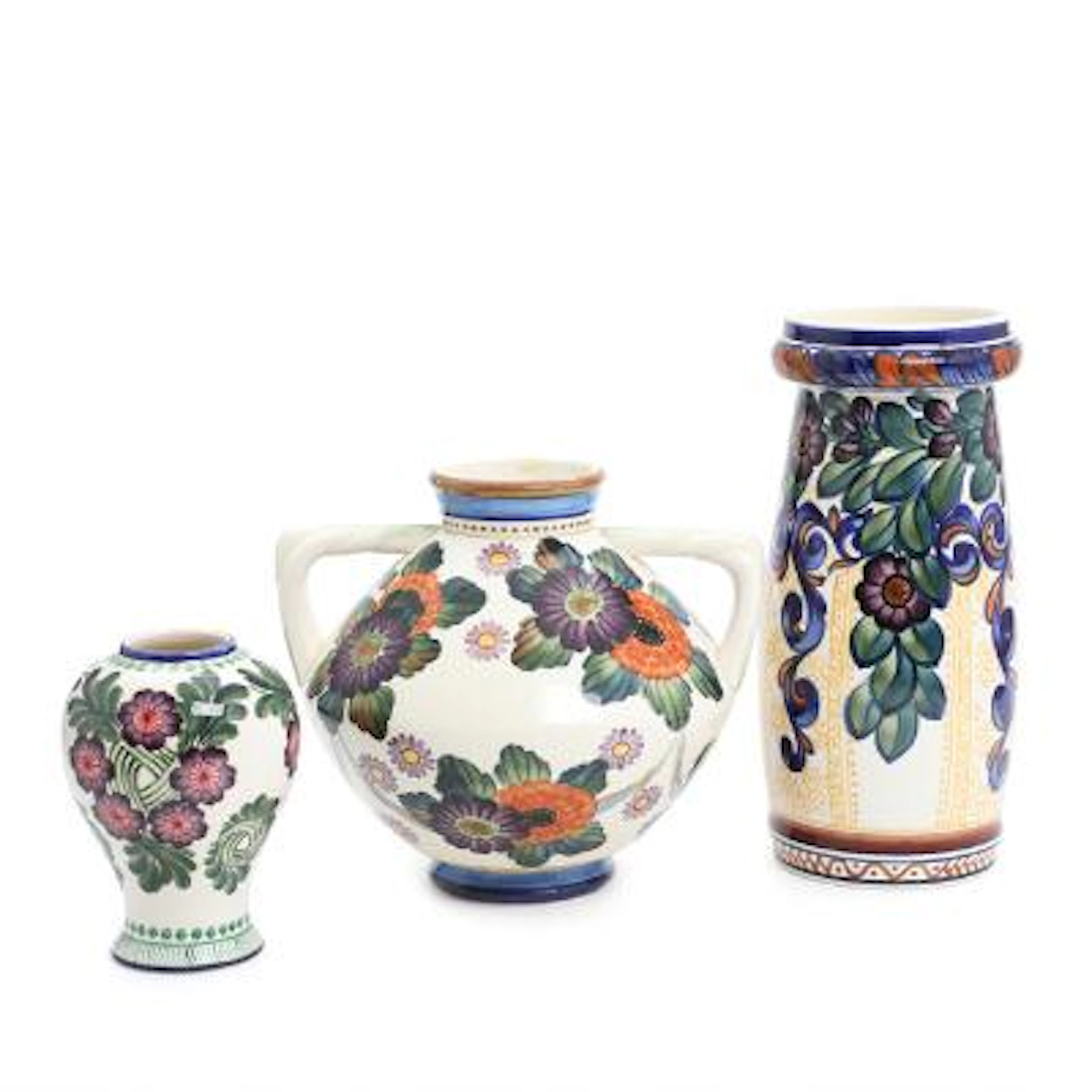 Three faience vases, decorated in colours with flowers. 394, 512 and