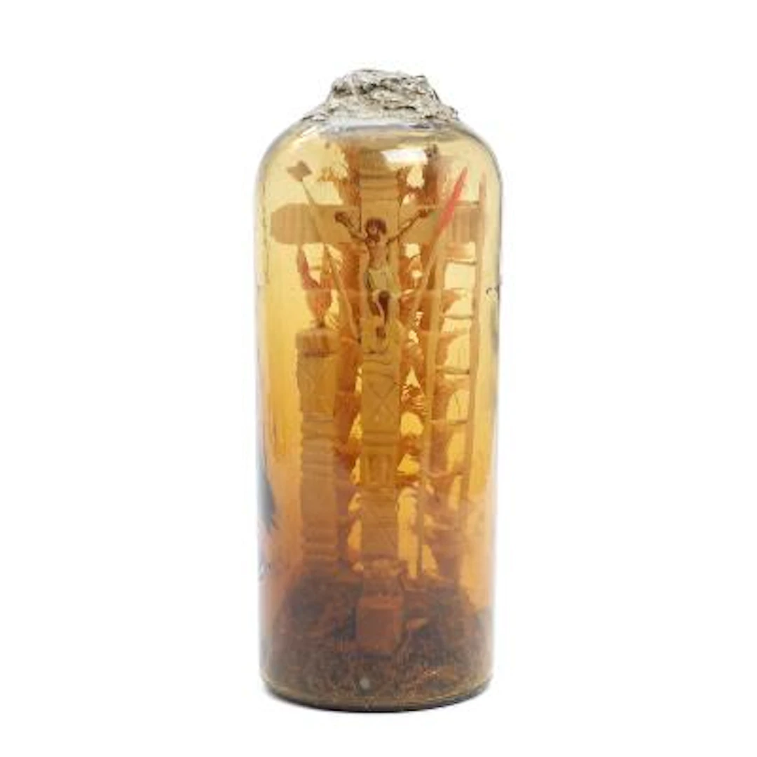 Bottle ship / "Geduldsflasche eingericht," with crucifix. Southern