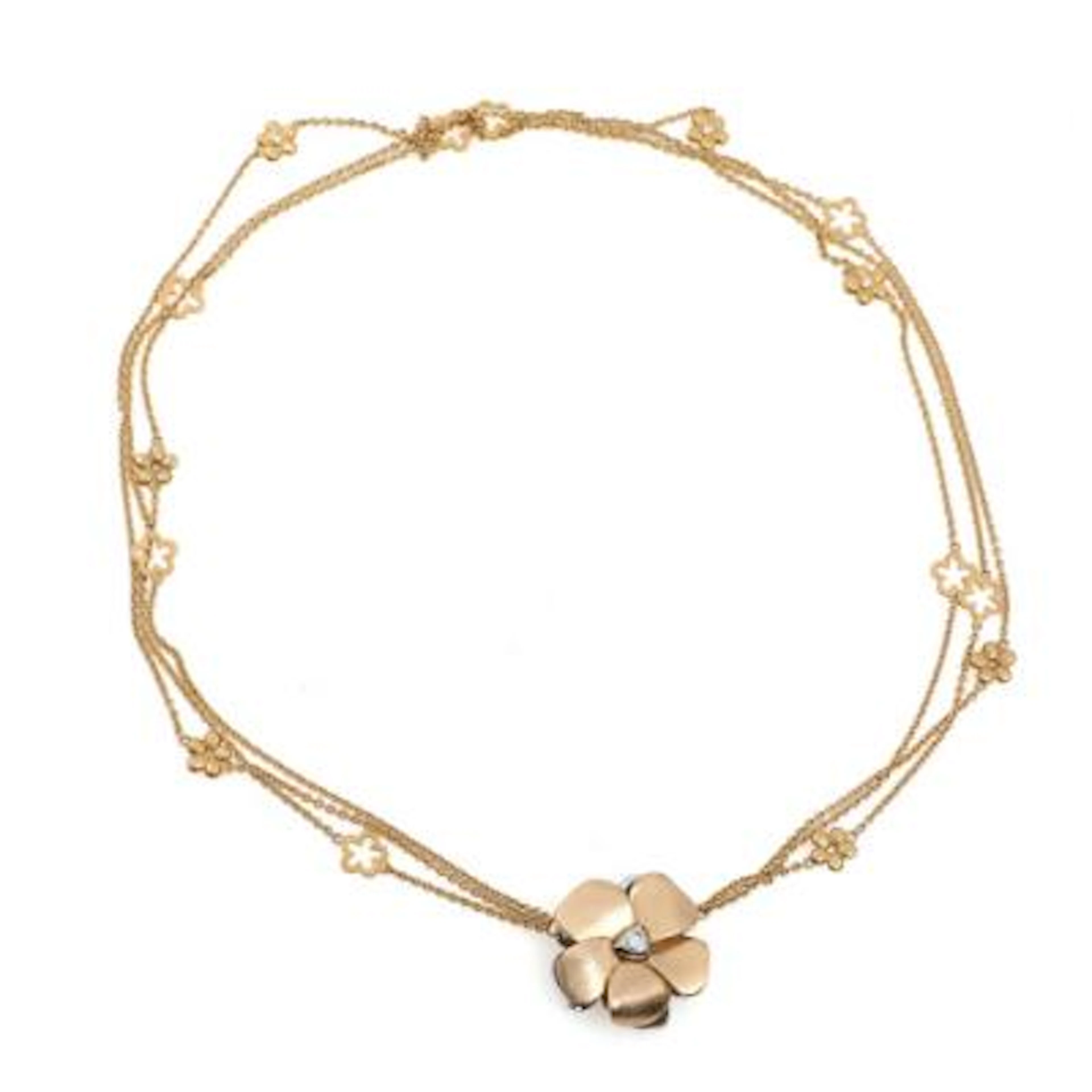 Ole Lynggaard: Flower clasp in 14k gold and white gold set with diamonds