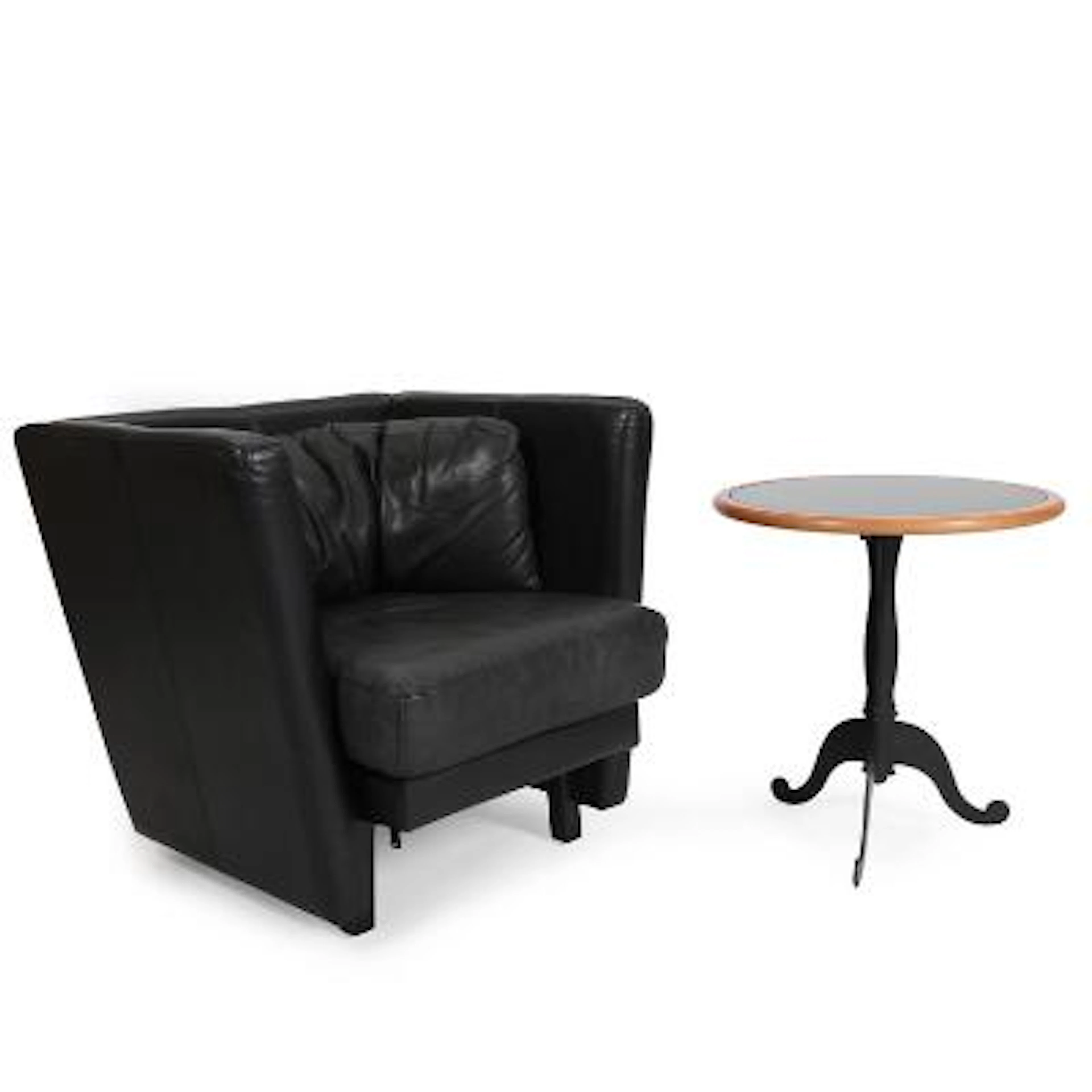 Leolux and others: Easy chair upholstered with black leather and black