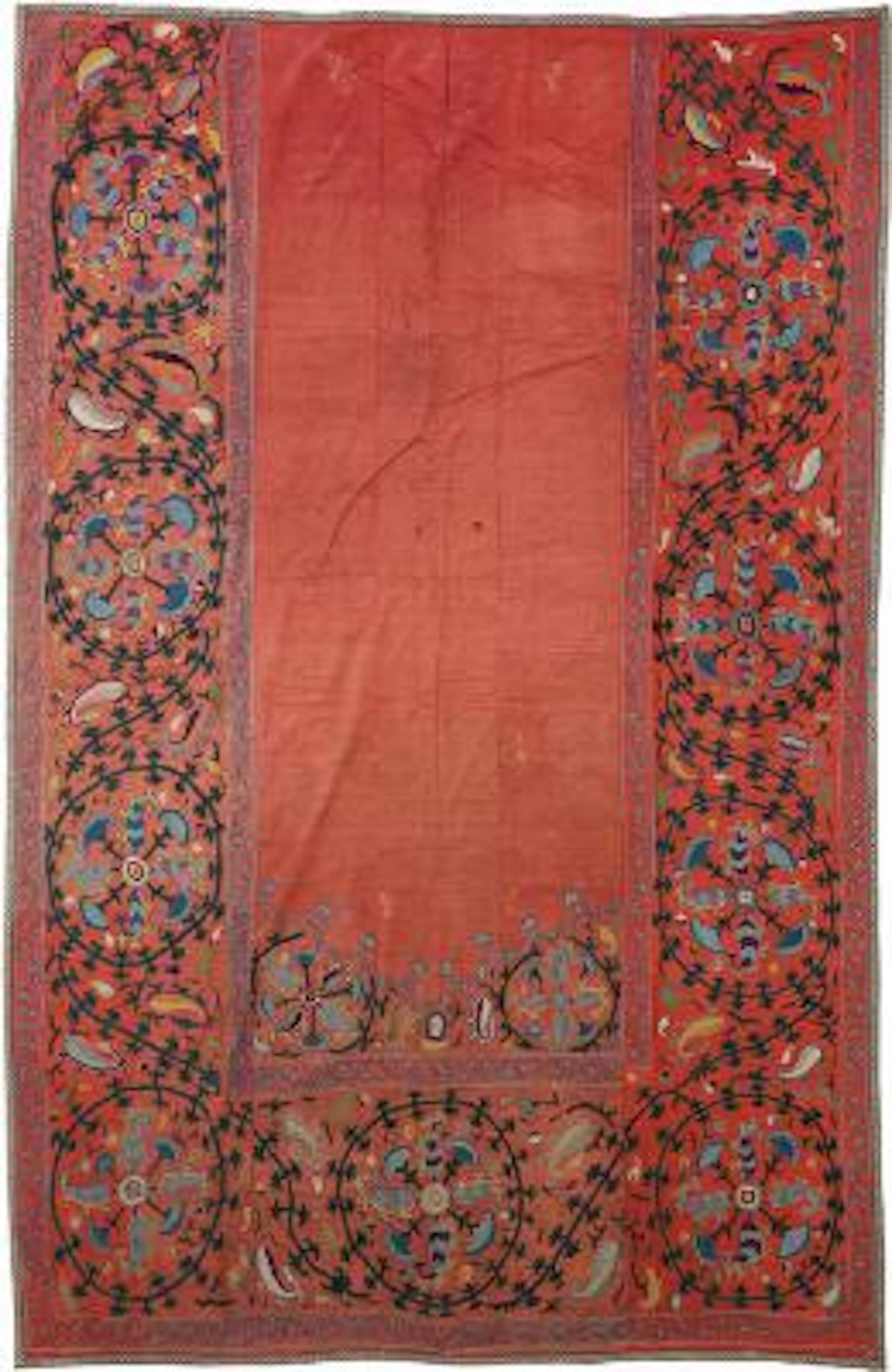 A Suzani silk embroidery, Uzbekistan. Arch design, open red field
