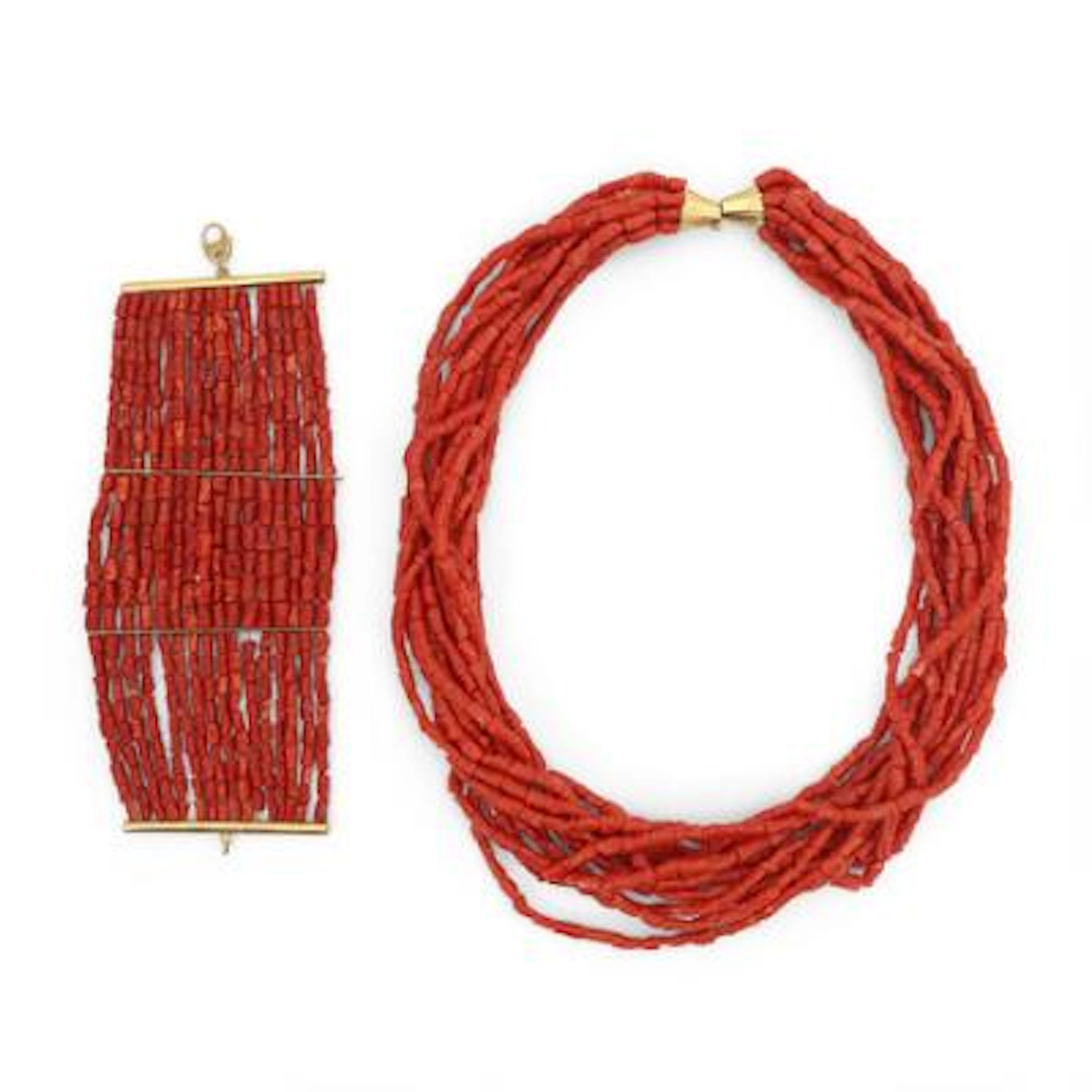 A coral jewellery set comprising of a necklace and a bracelet set