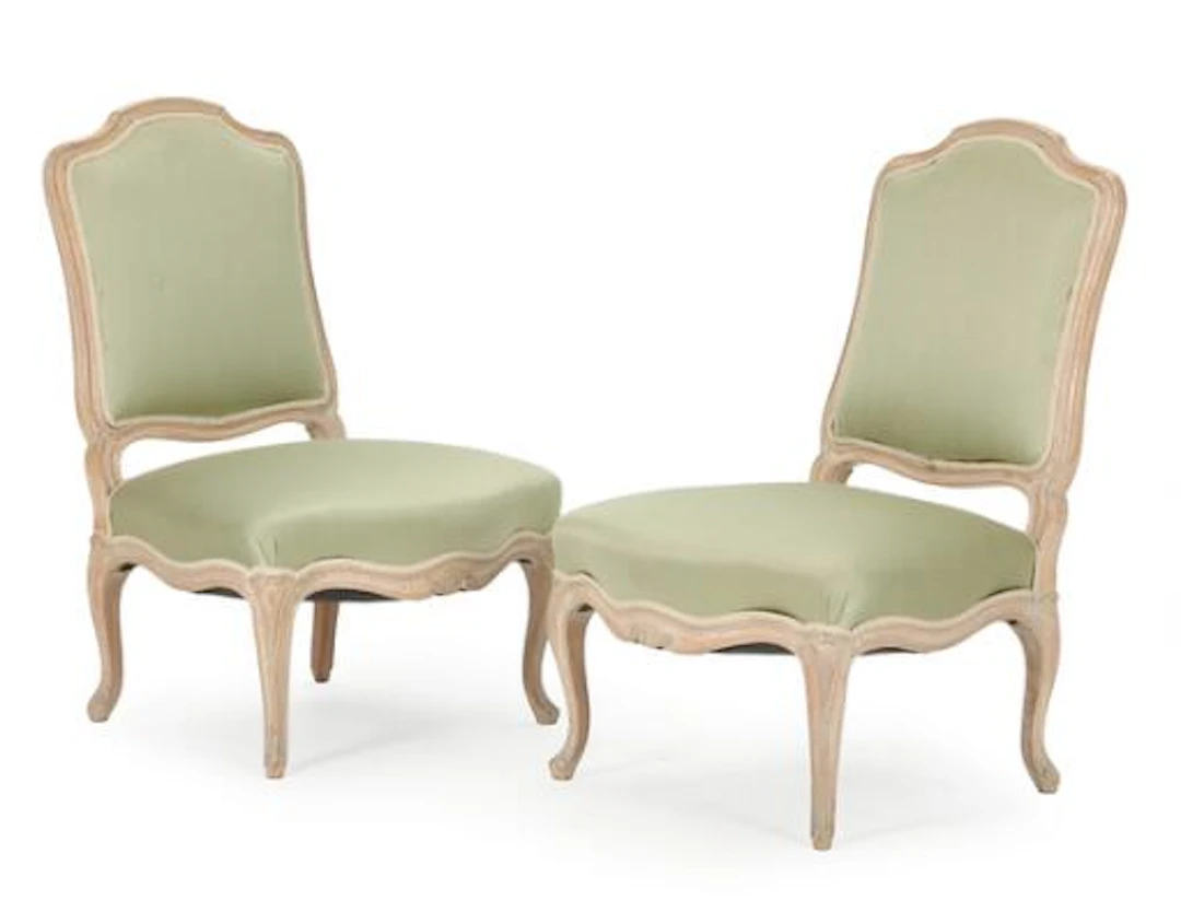 A pair of light painted beech wood Louis XV style chairs. 20th century.