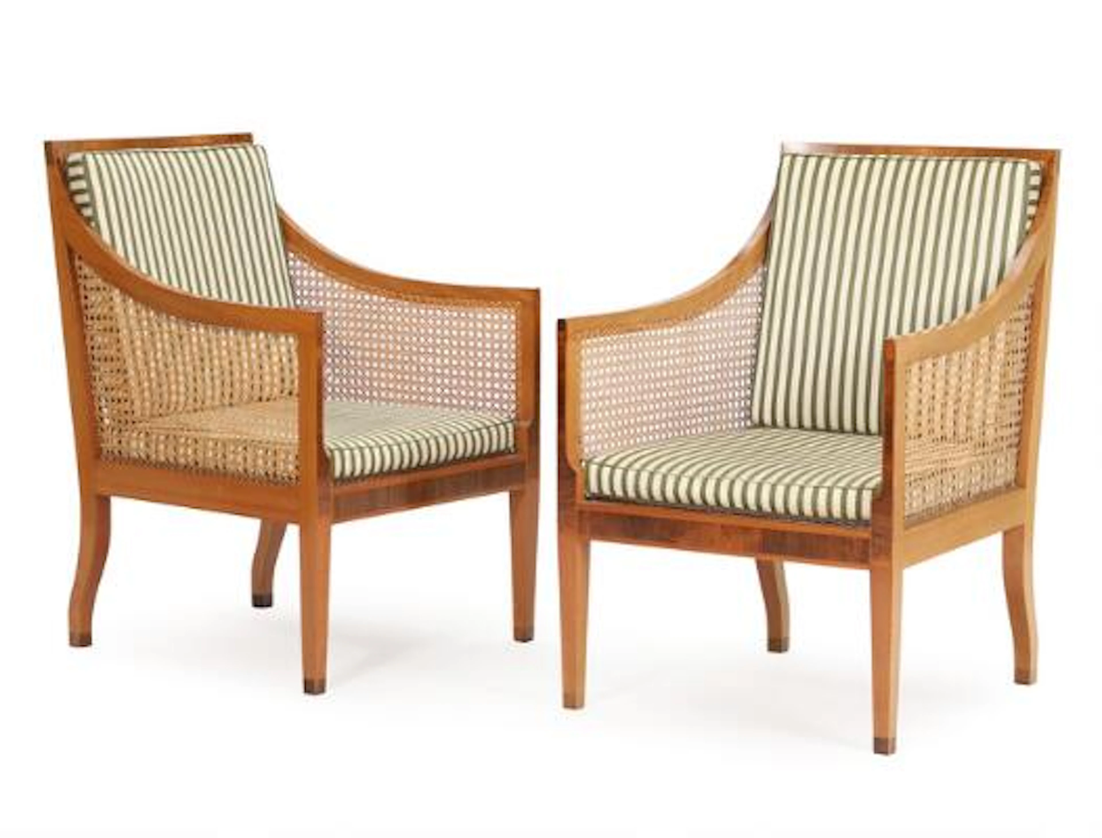 Kaare Klint: A pair of bergère in mahogany with cane seat and back.
